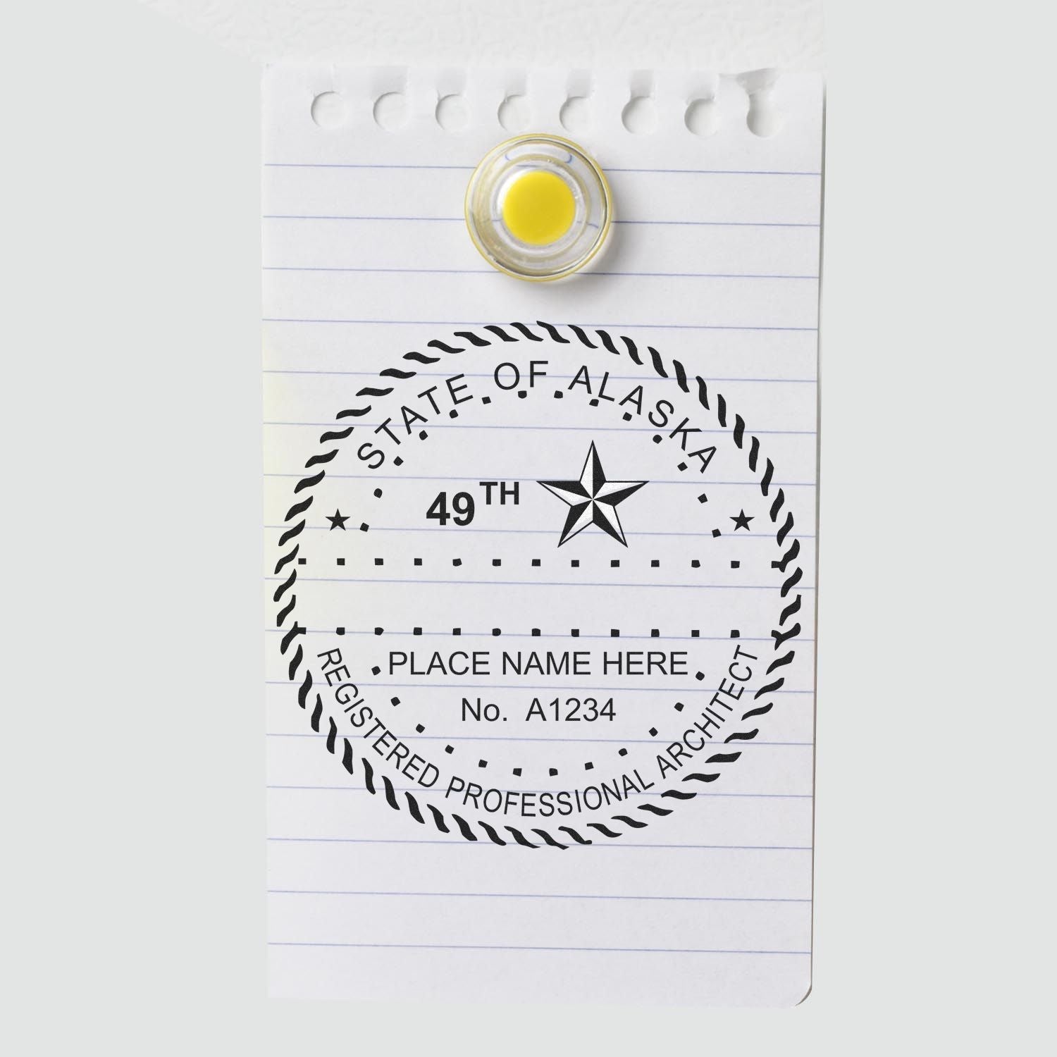 Image of a notepad with an Alaska architect seal and a push pin. Blog post: Alaska Architect Seal Regulations: A Must-Read for Architects Feature Image.