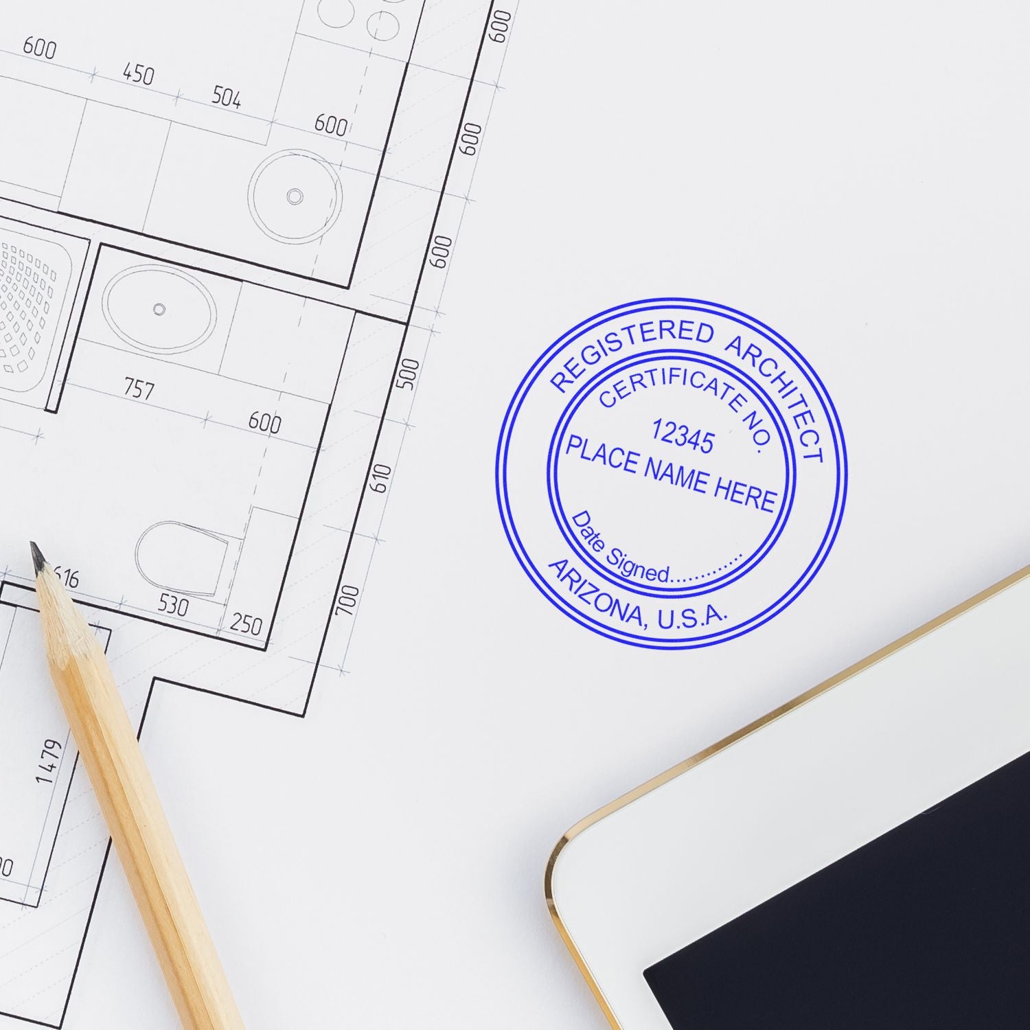 Round Arizona Registered Architect Seal image on architectural plans with pencil and tablet.