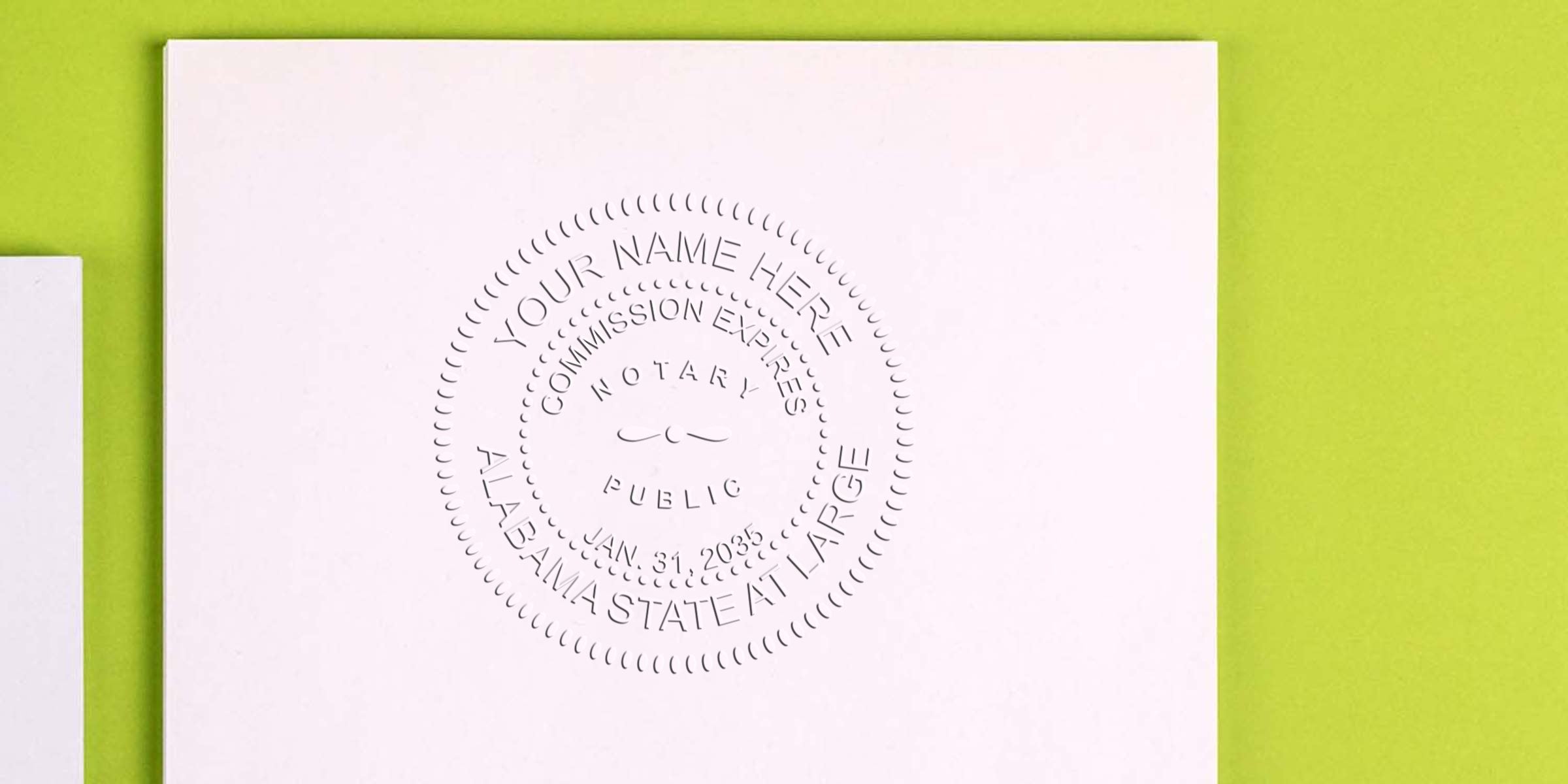 Embossed circular notary public seal on white stationery with decorative scalloped border, placeholder text "Your Name Here" and "Alabama State at Large," photographed on a bright lime green background