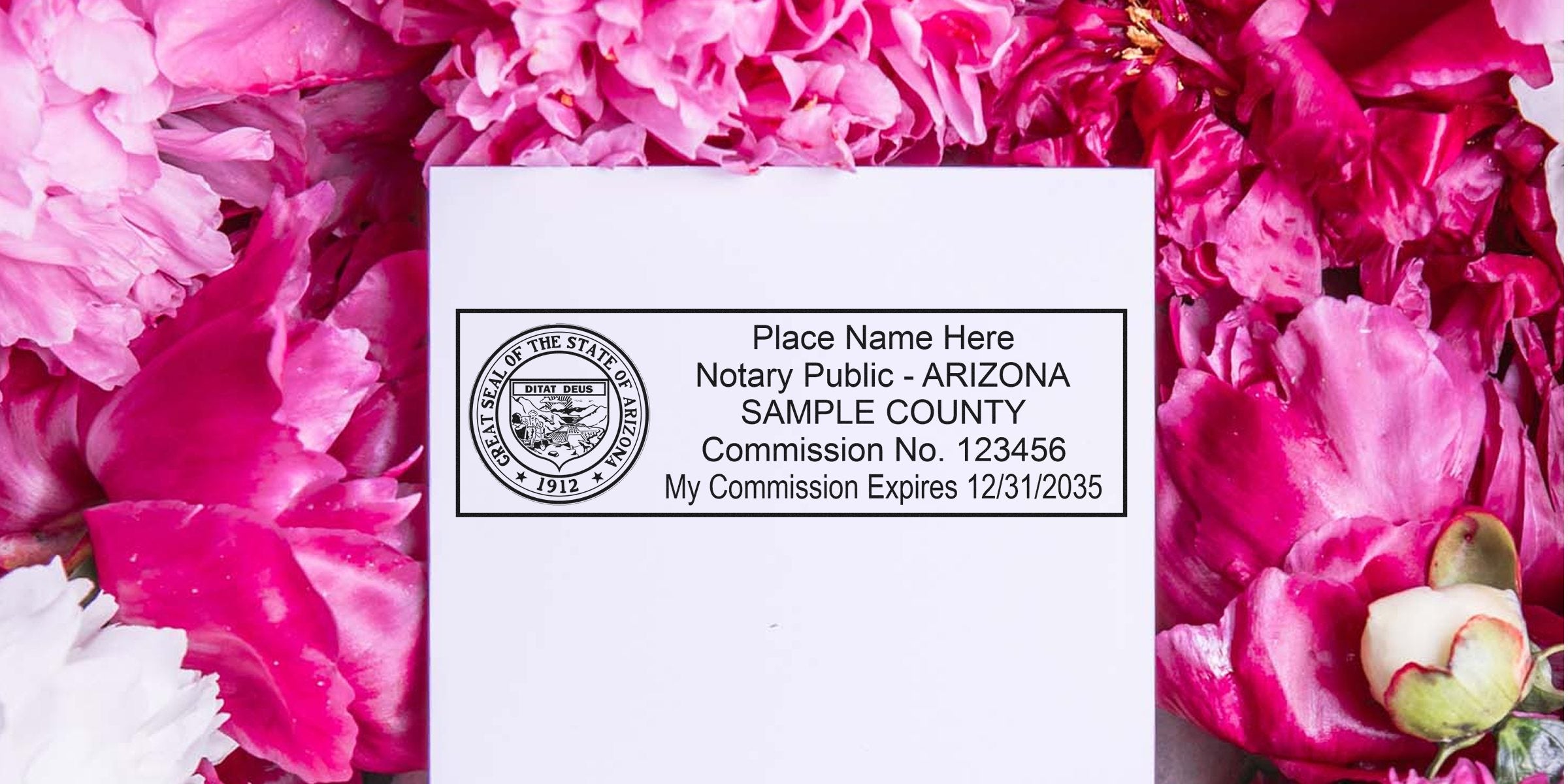 Blank notary stamp sample card showing Arizona state seal and sample commission details on white paper, surrounded by vibrant pink peony petals
