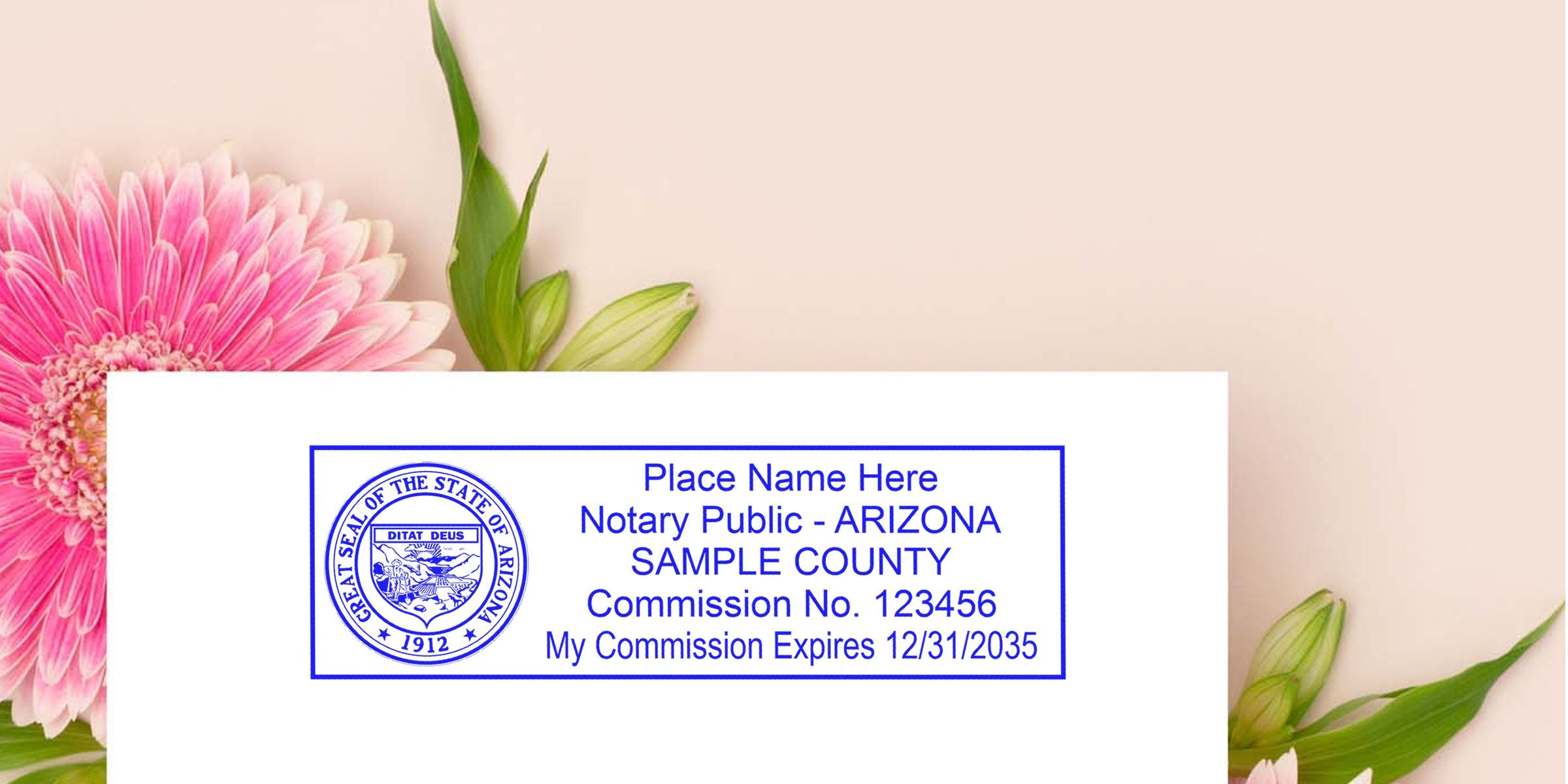 Pink gerbera flower and green leaves beside a white sheet displaying a blue Arizona notary public stamp sample with state seal, sample county, commission number and expiration date