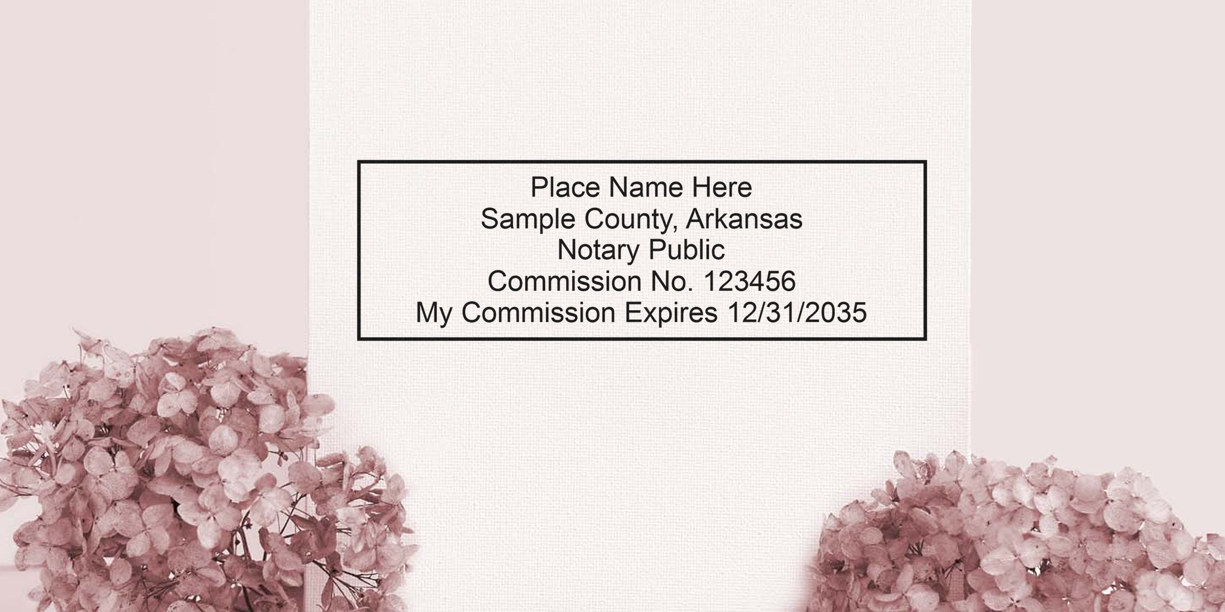 Notary public stamp mockup on textured paper reading "Place Name Here, Sample County, Arkansas. Commission No. 123456. My Commission Expires 12/31/2035" with pink hydrangea floral accents.