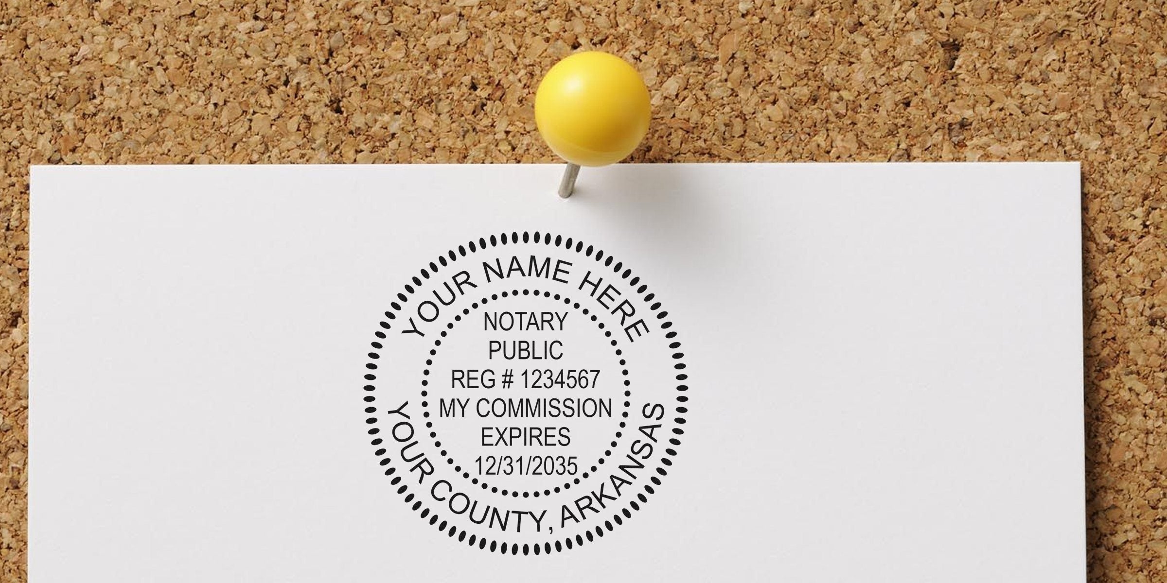 White paper pinned to corkboard with yellow pushpin, showing a circular notary public rubber stamp imprint with placeholder text (name, county, registration number, commission expiry).