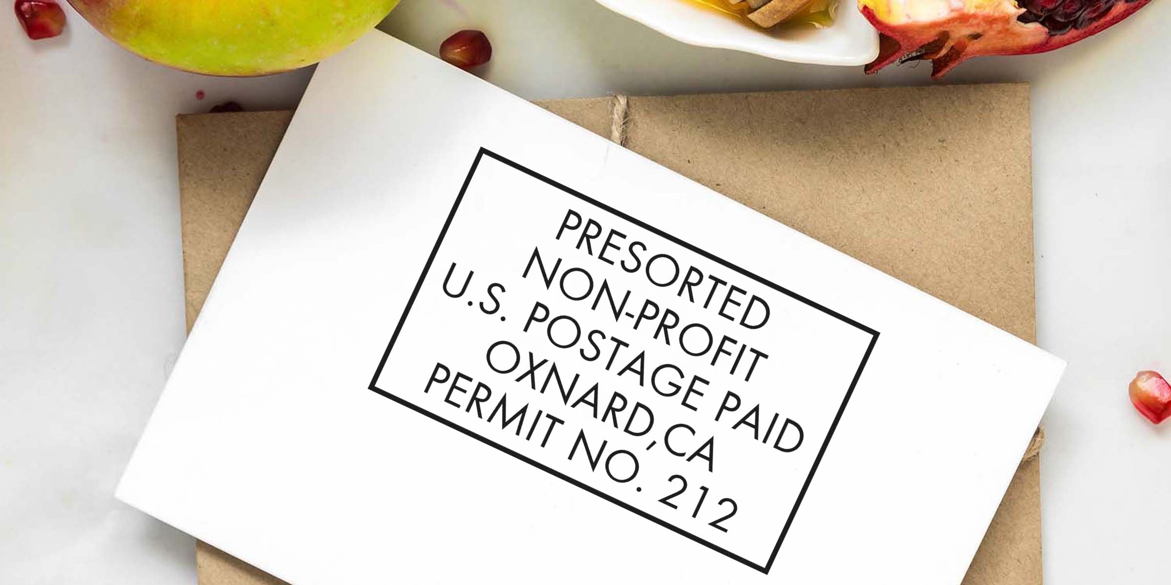 Envelope with a black-bordered label reading “PRESORTED NON-PROFIT U.S. POSTAGE PAID OXNARD, CA PERMIT NO. 212.”