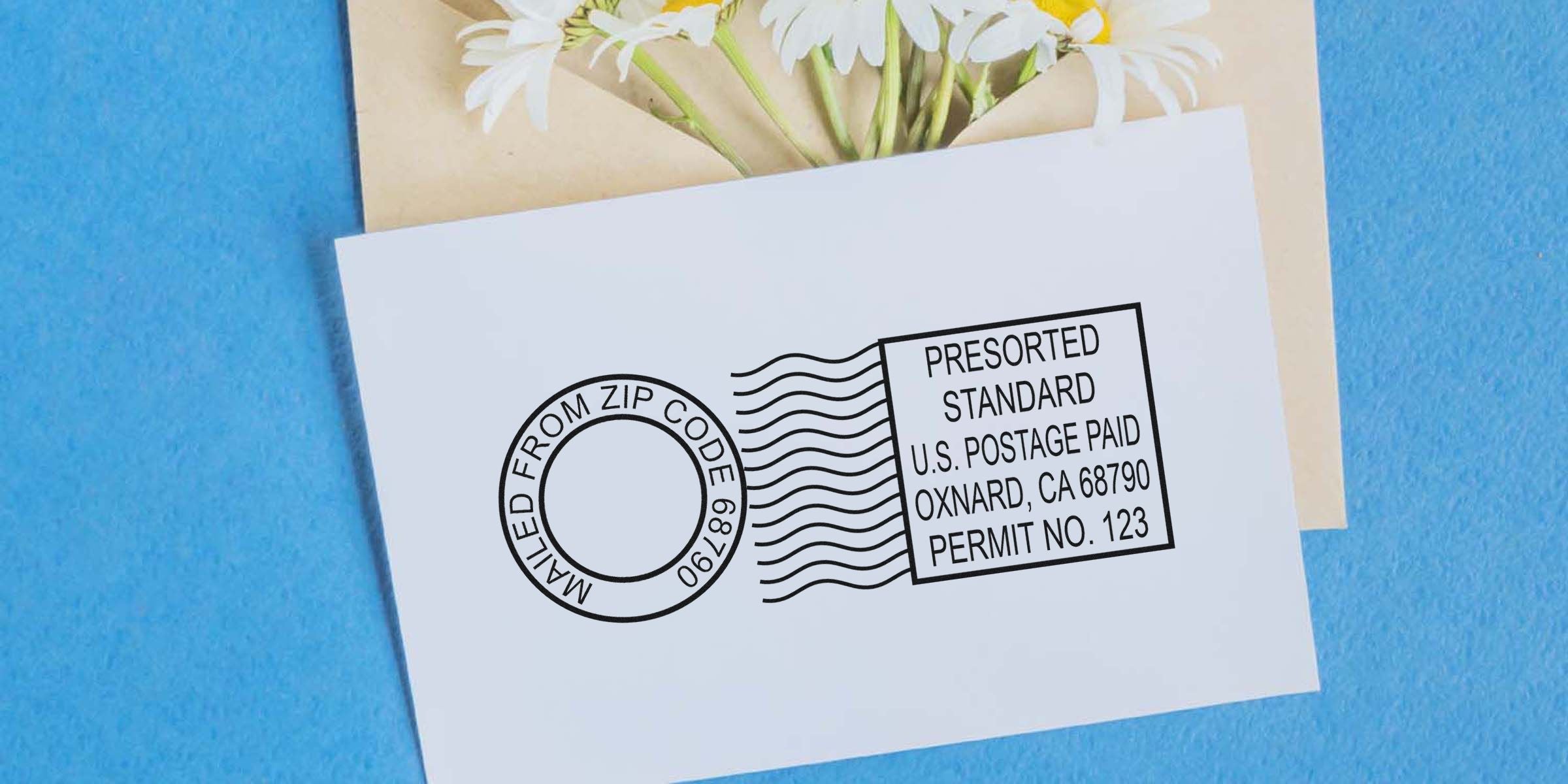 Postcard featuring a stamped envelope graphic with a circular “MAILED FROM ZIP CODE 68990” seal and a “PRESORTED STANDARD” postmark on a blue background with daisies.