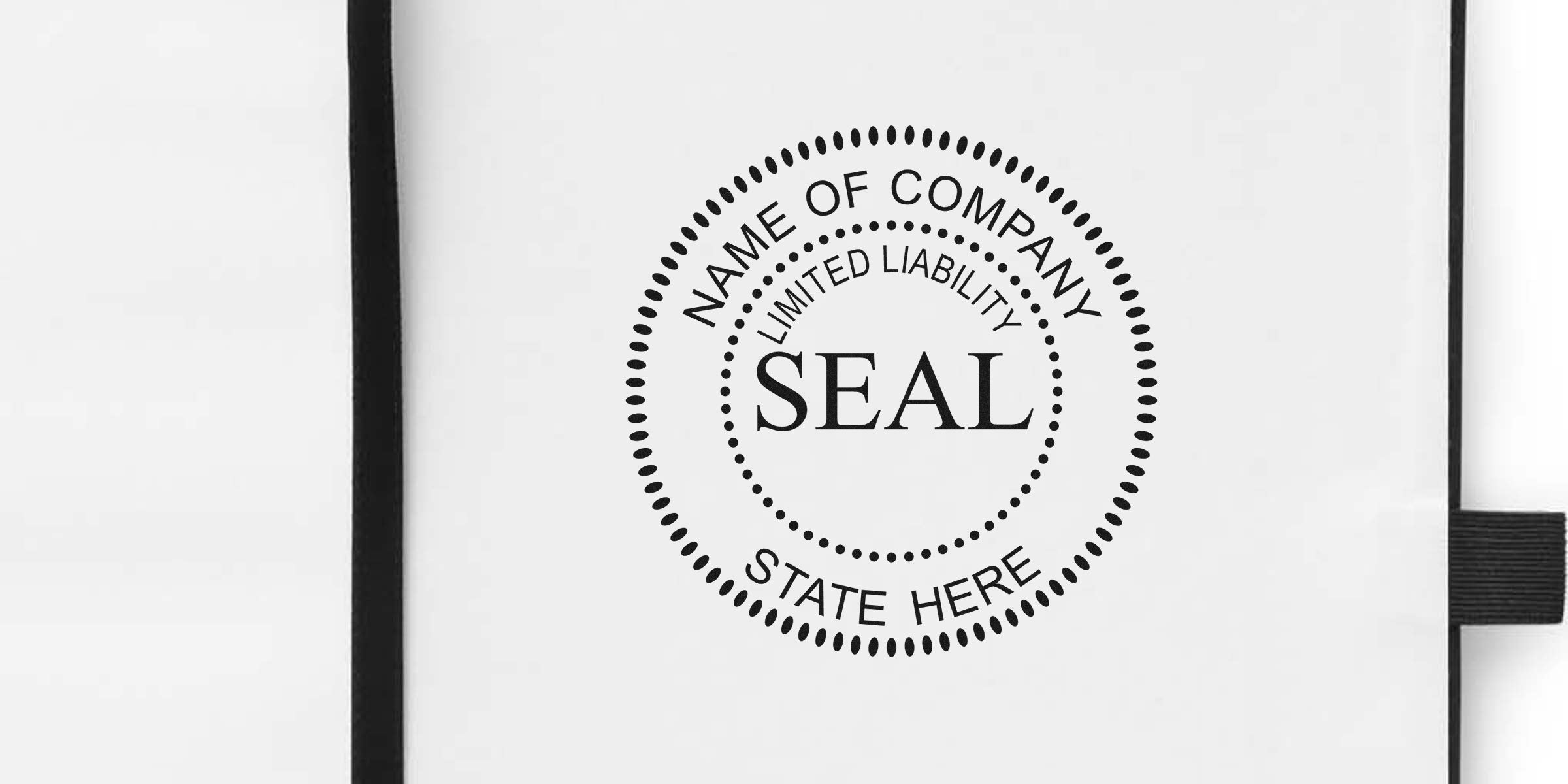 Circular seal with a dotted border and the word SEAL in the center, surrounded by placeholder text "NAME OF COMPANY" and "STATE HERE" along the ring.