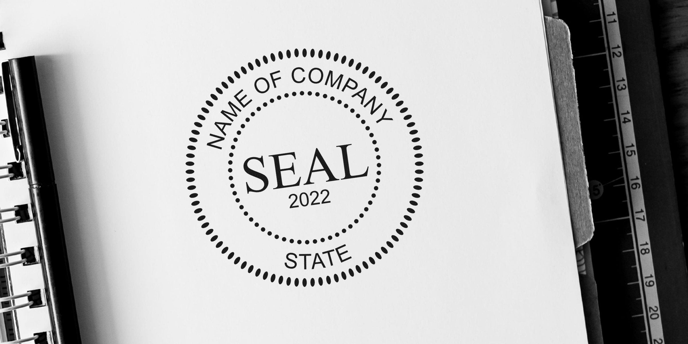 Circular company seal with the word SEAL and the year 2022.