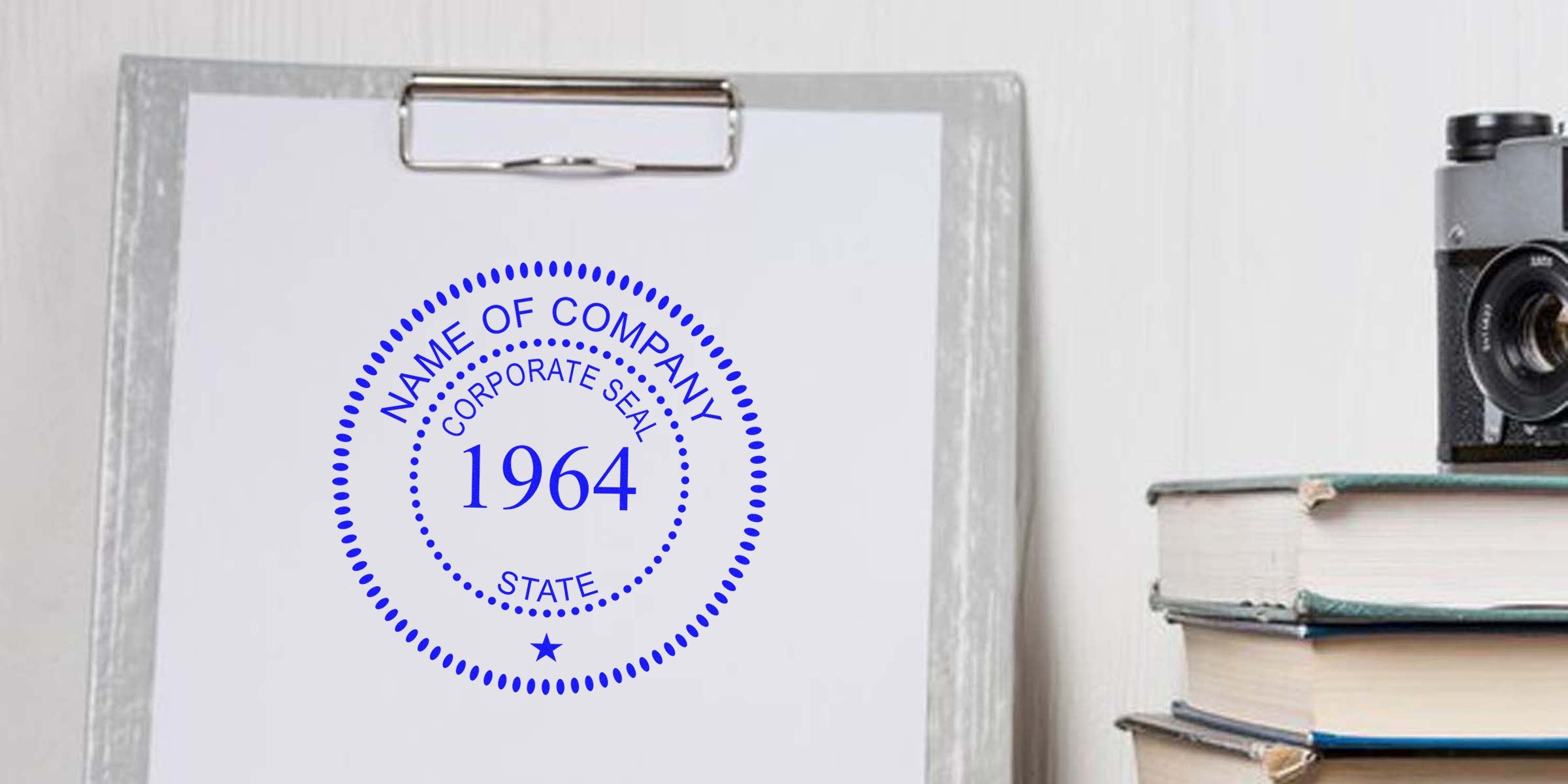 Blue circular corporate seal with the year 1964 on a clipboard.