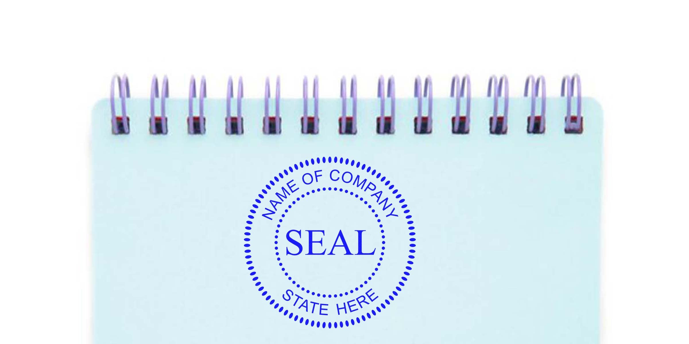 Blue circular seal stamp with the word SEAL on a light blue spiral notebook page.