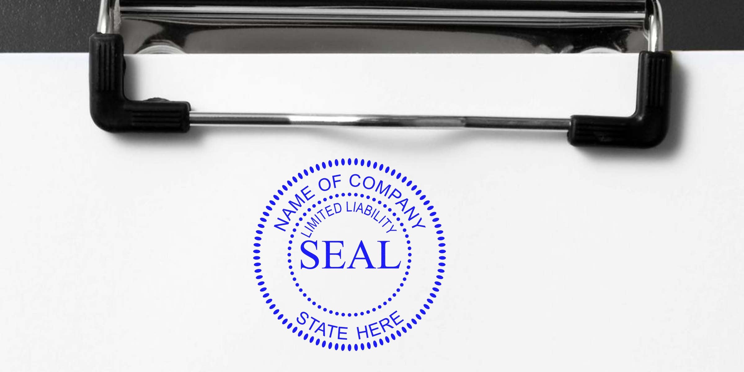 Blue circular company seal stamp reading "NAME OF COMPANY" on a white clipboard.