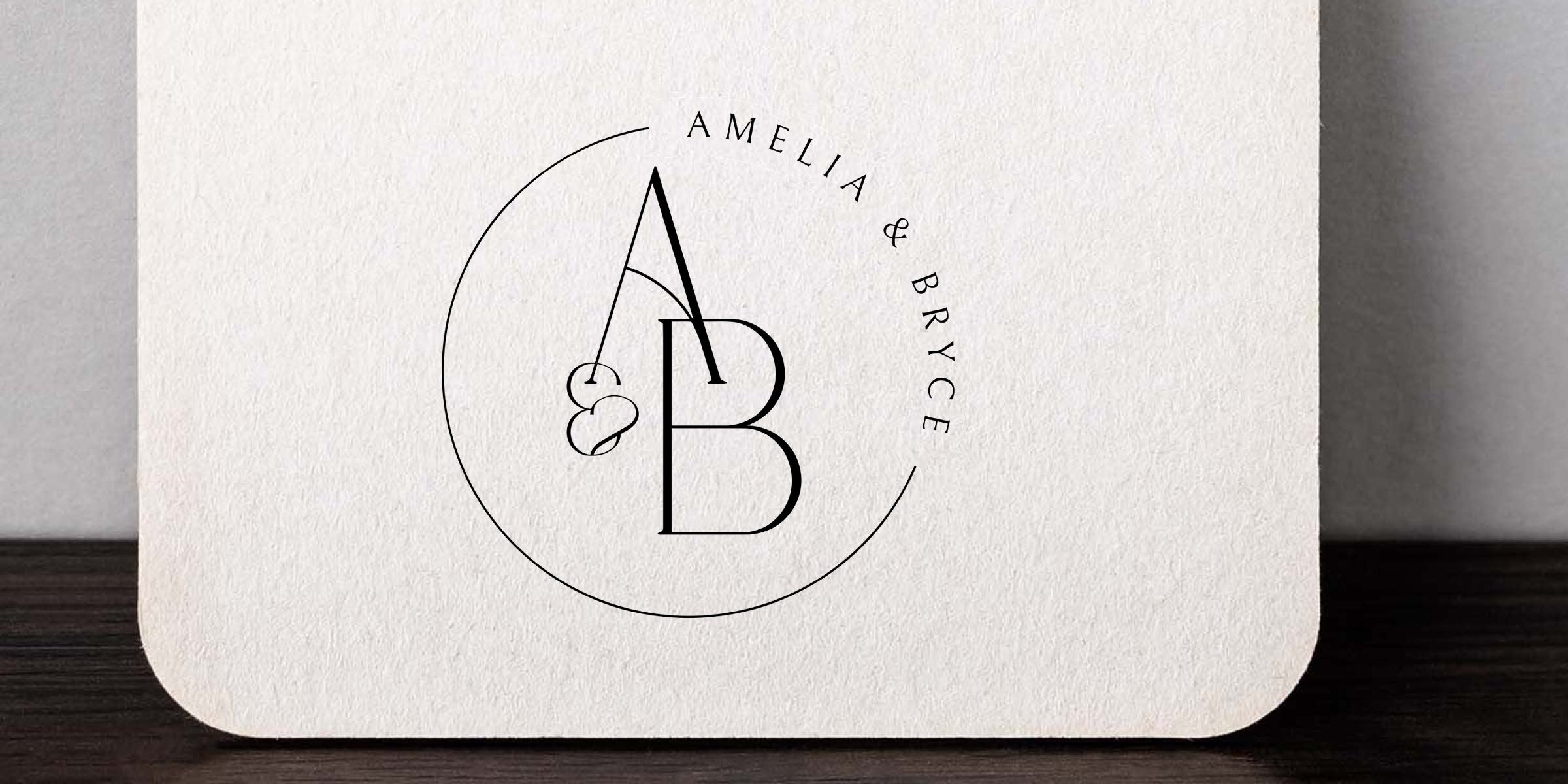 Minimalist black monogram logo A & B inside a thin circular frame with curved "Amelia & Bryce" text on textured off-white paper, elegant modern wedding stationery design.