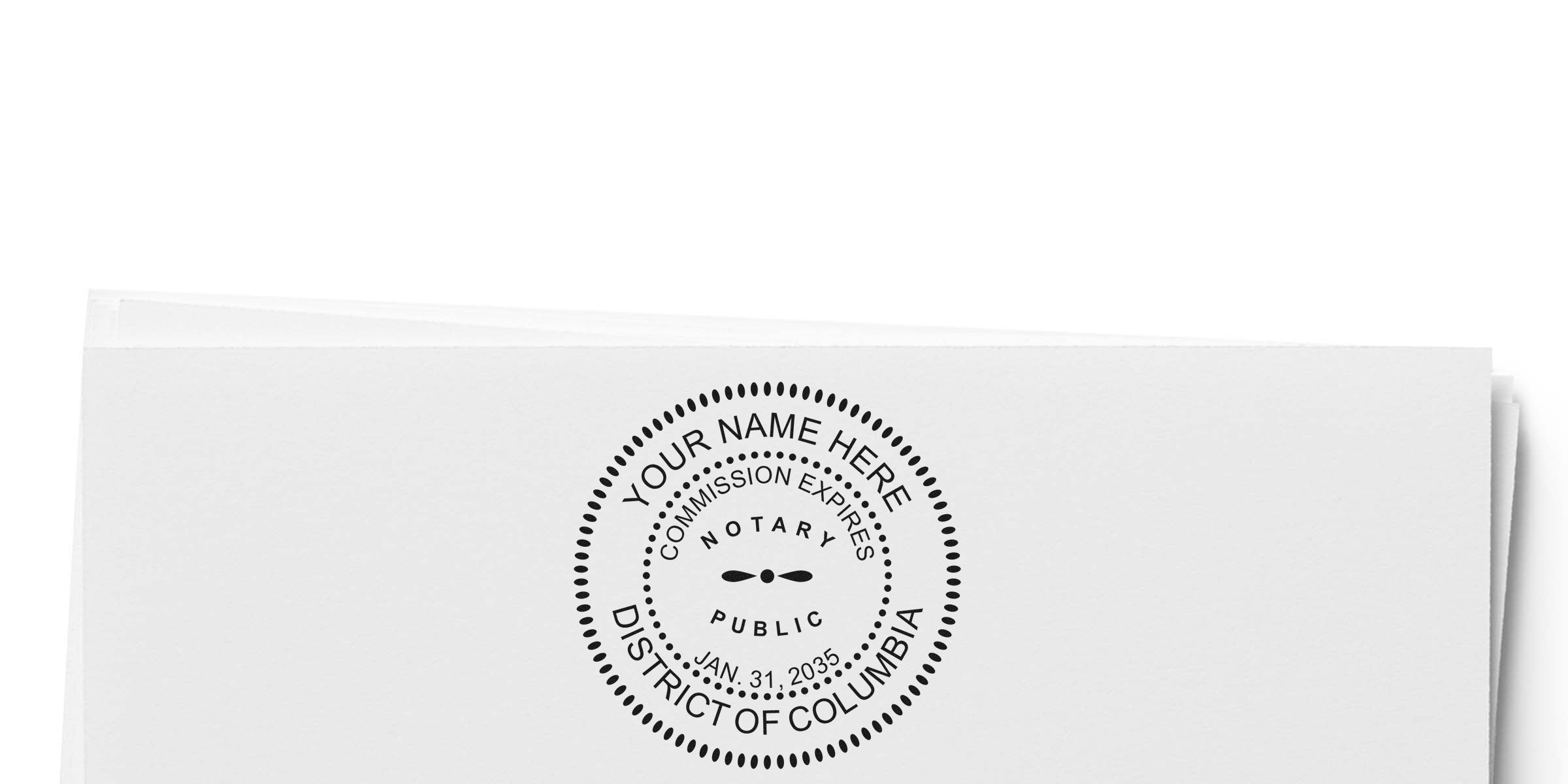 Close-up of a circular notary public stamp impression on white folded paper reading "Your Name Here, District of Columbia" with commission expiration Jan 31, 2035.