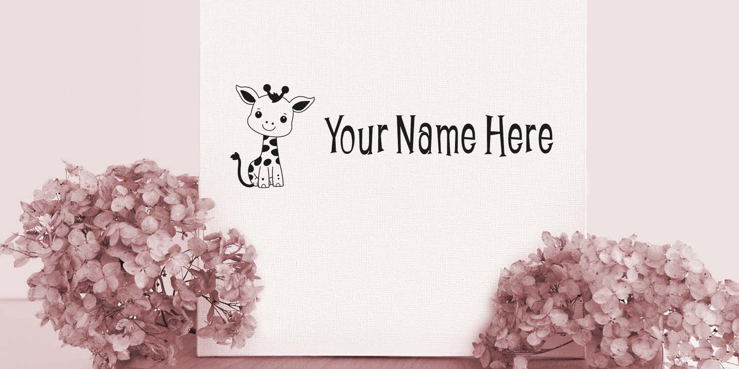Decorative white canvas reading “Your Name Here” with a cartoon giraffe, flanked by pink hydrangea blooms.