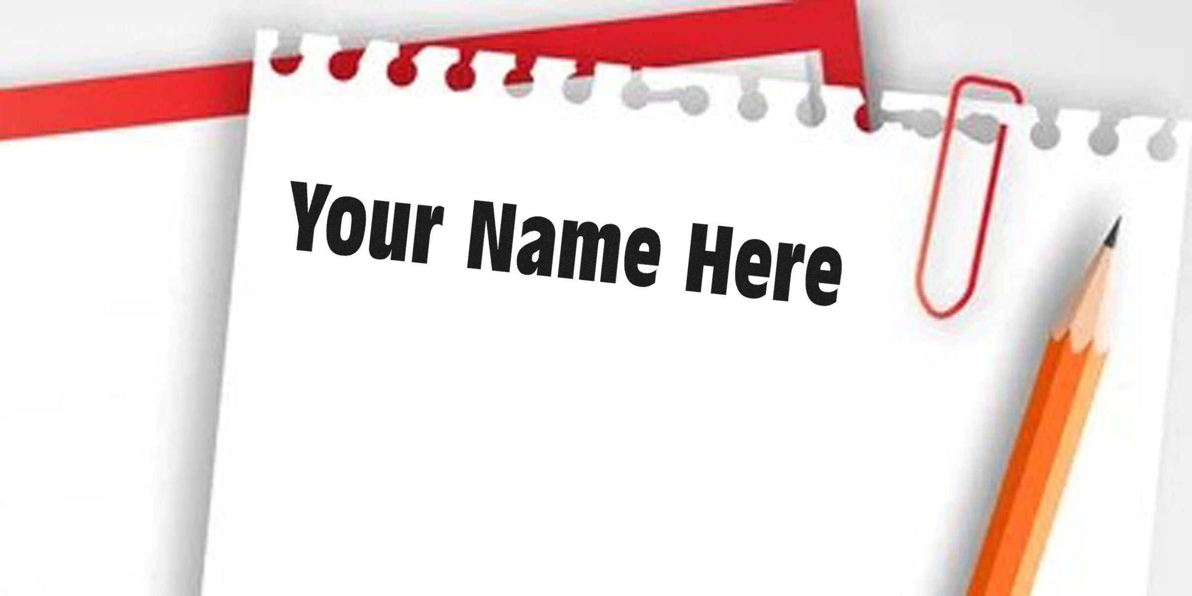 Notebook page reading “Your Name Here” with a red paper clip and orange pencils.