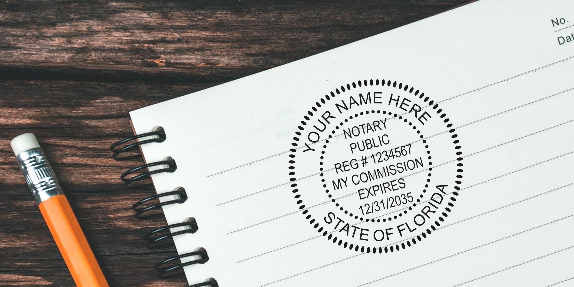 Notary public circular seal stamp reading "State of Florida" on a lined spiral notebook page, yellow pencil beside it on a dark wooden desk, concept of notarized documents and office supplies