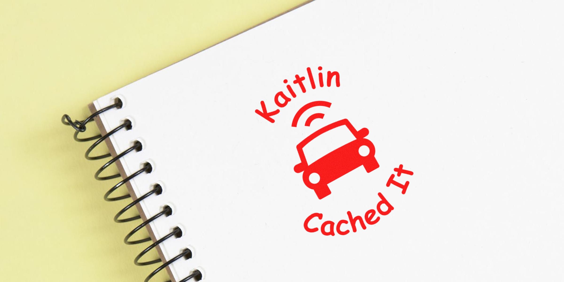 White notebook page displaying a red logo with a car and the text “Kaitlin Cached It.”
