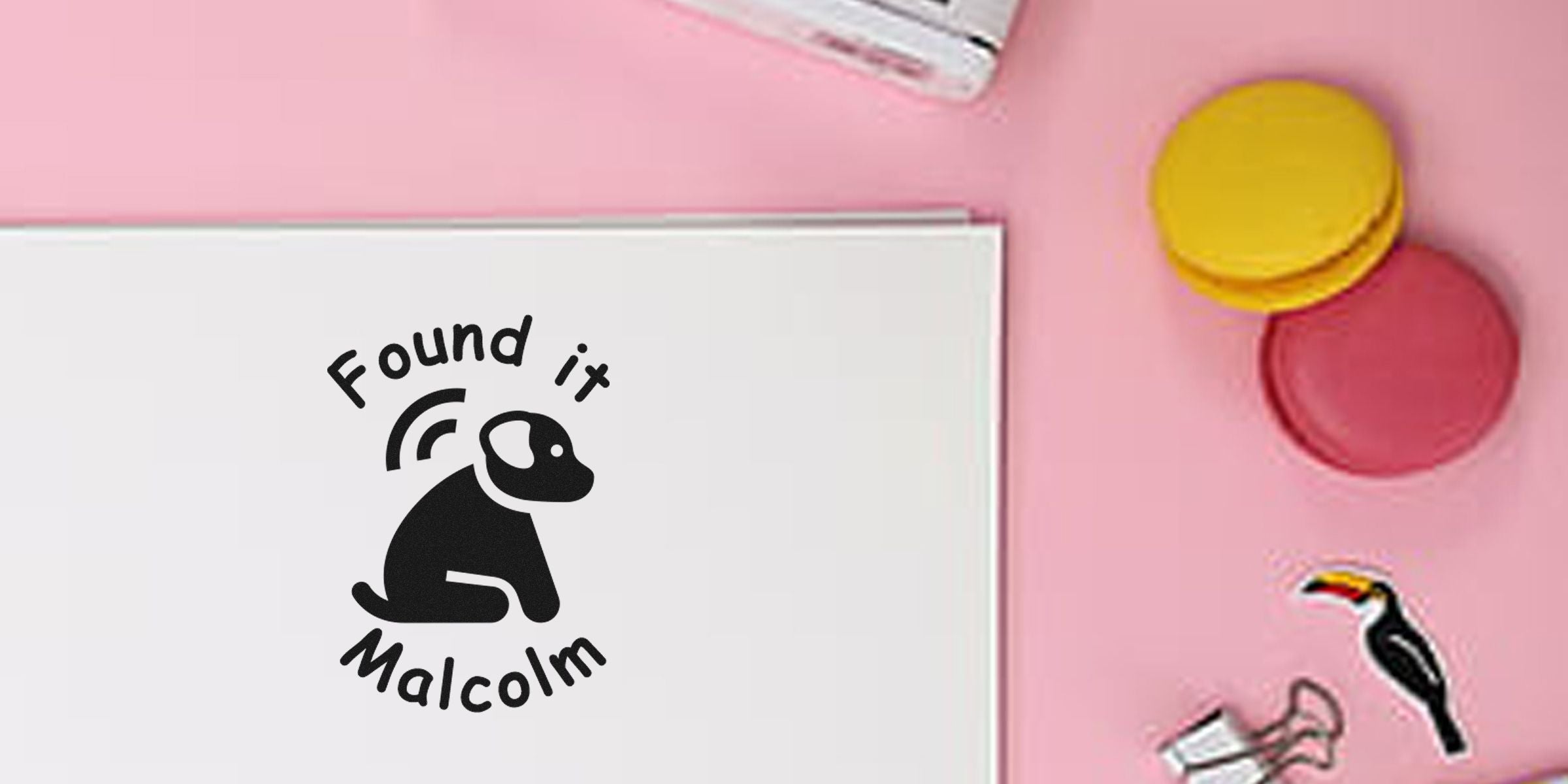 Logo of Found it Malcolm featuring a black dog silhouette.