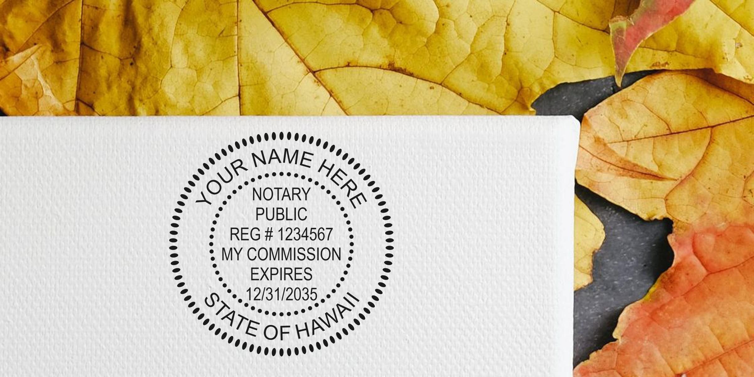 Round notary public seal mockup on textured white paper reading "State of Hawaii" with registration and expiry details, set against yellow and orange autumn leaves background