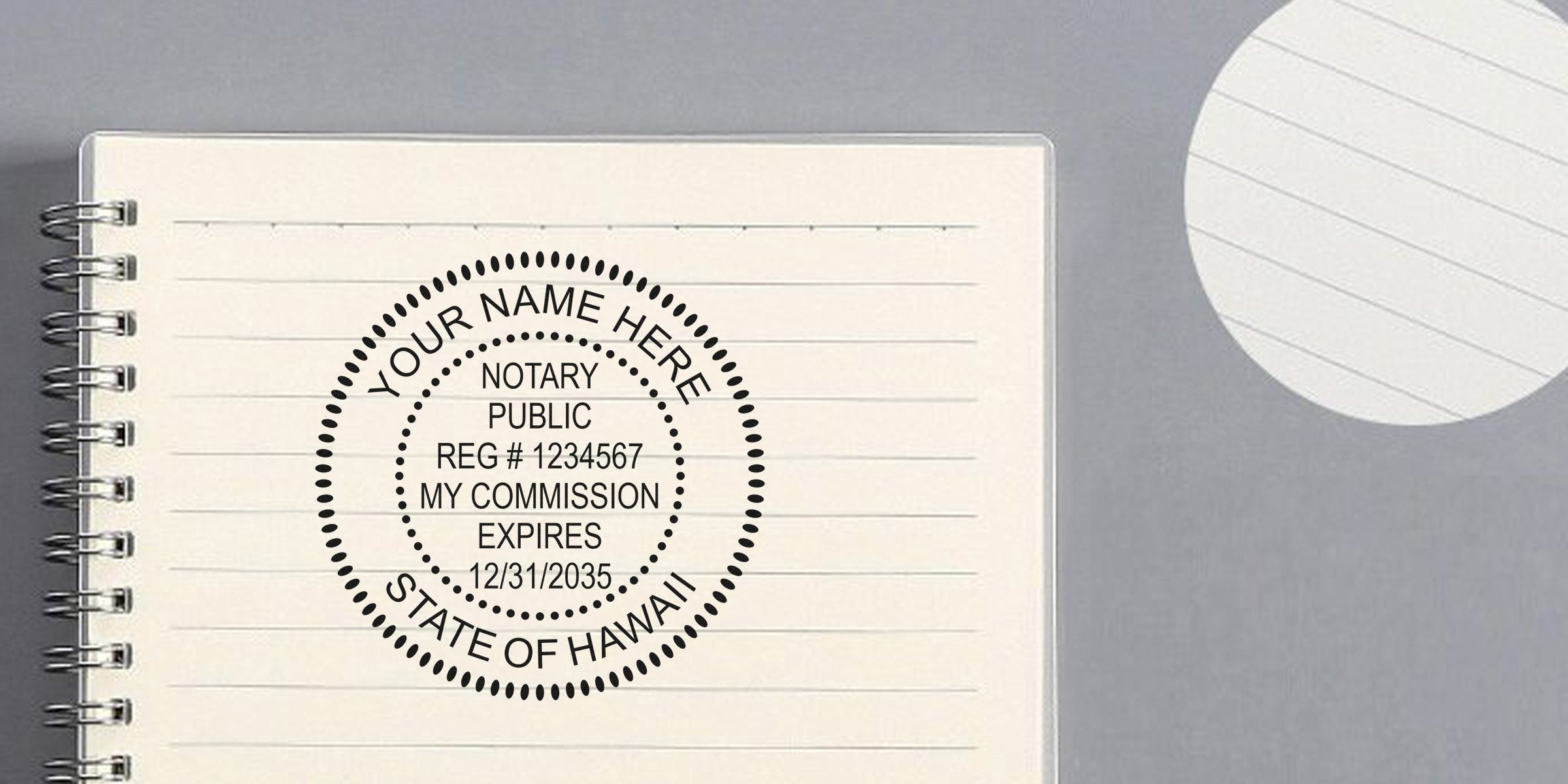 Round notary public stamp mockup on lined spiral notebook, customizable "Your Name Here" seal with sample reg# and commission expiry, State of Hawaii notary seal design.