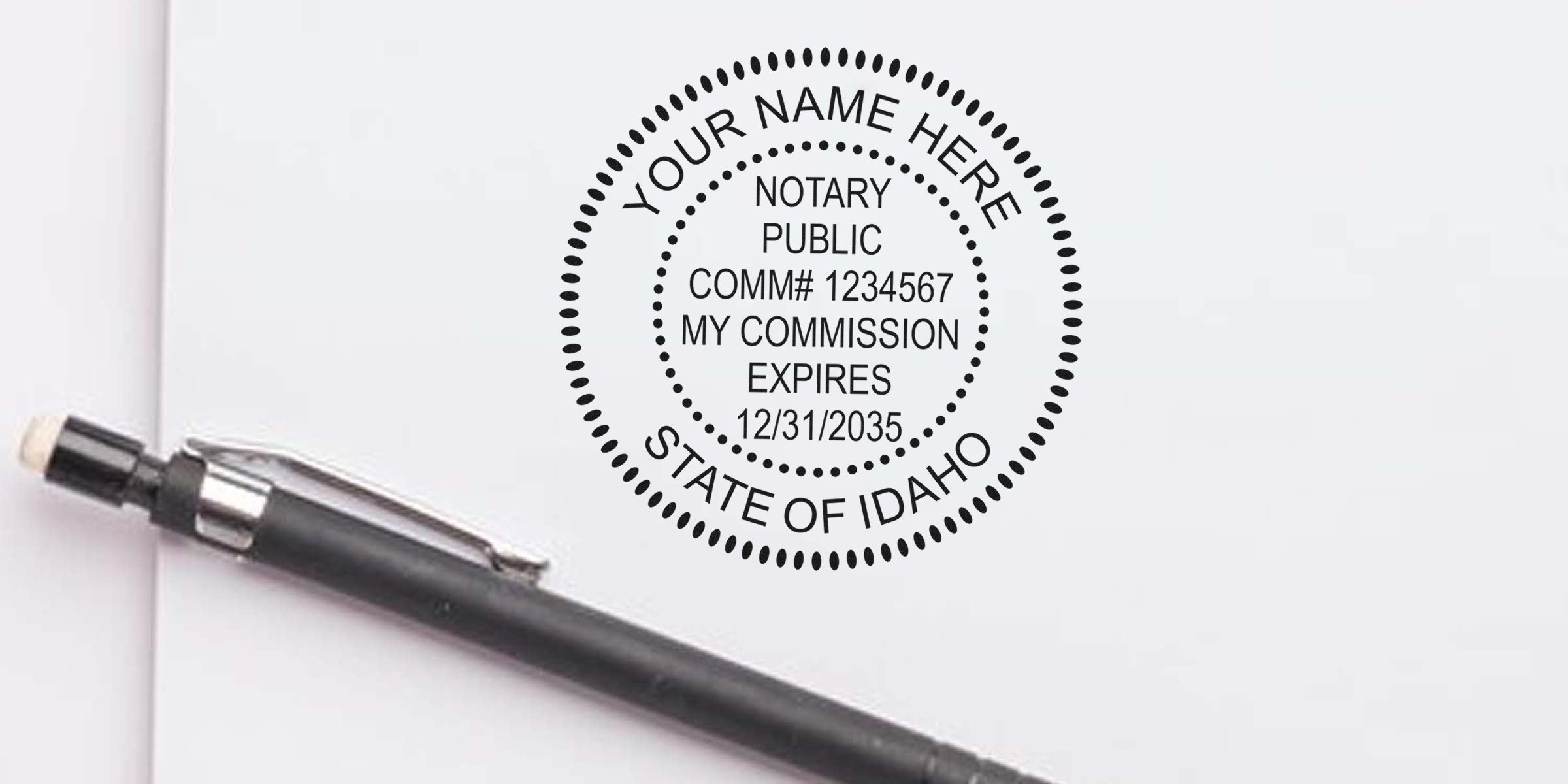 Notary public round stamp mockup reading "Your Name Here, Notary Public, Comm# 1234567, My Commission Expires 12/31/2035, State of Idaho" beside a black mechanical pencil on white paper