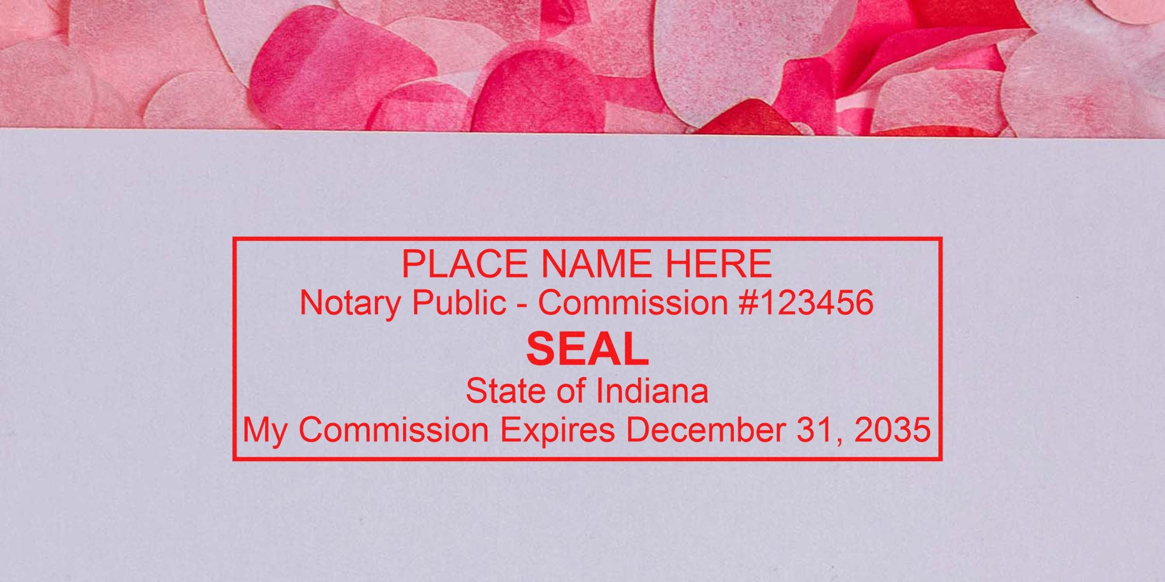 Red rectangular notary seal stamp on paper reading "PLACE NAME HERE Notary Public - Commission #123456 SEAL State of Indiana My Commission Expires December 31, 2035" with pink petal border at top