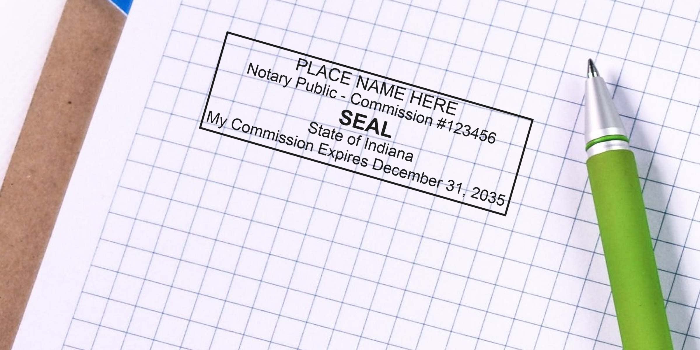 Notary seal imprint on graph paper showing placeholder text "PLACE NAME HERE", "Notary Public", commission number and expiration date, beside a green ballpoint pen and clipboard edge.