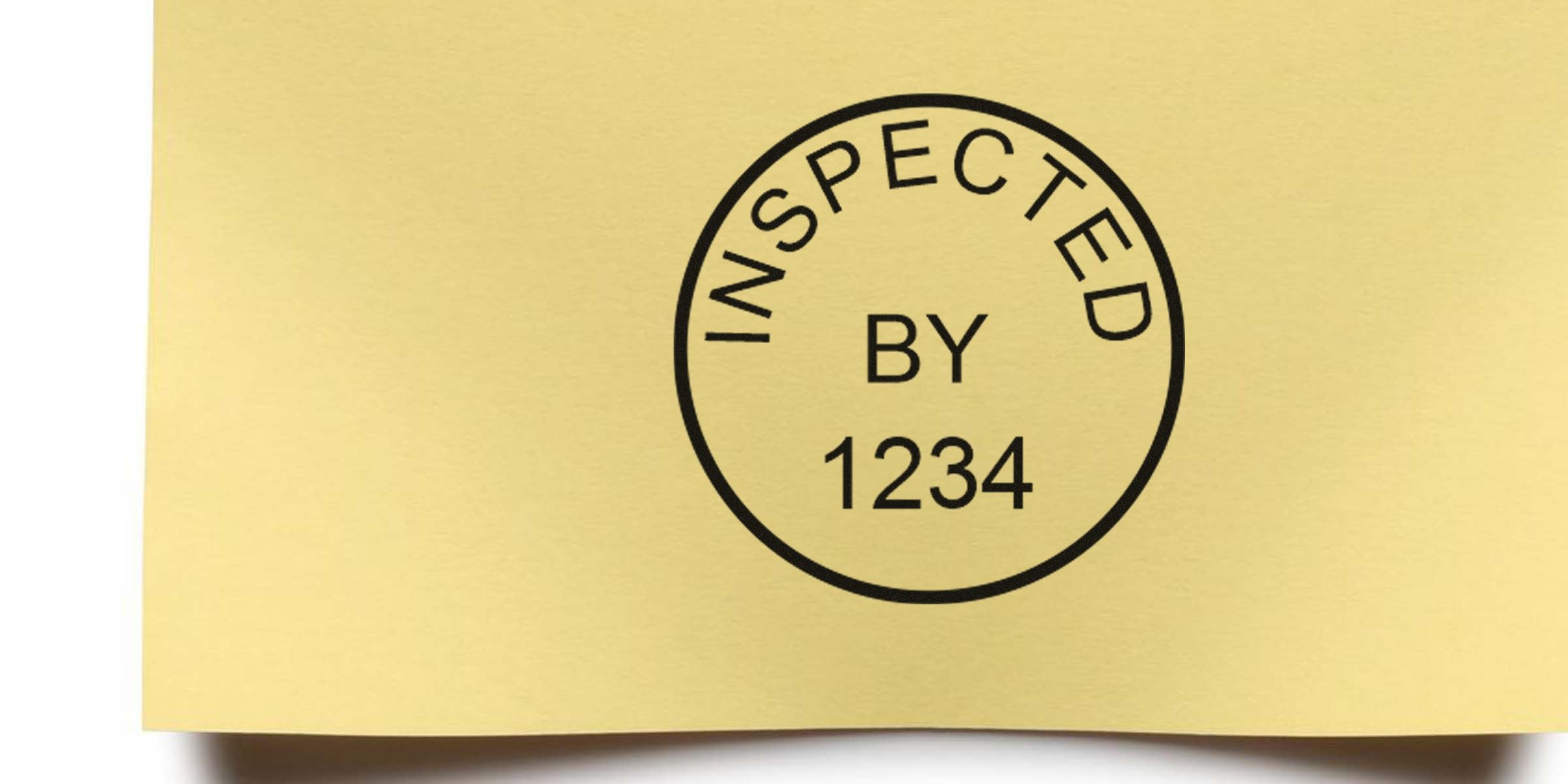 Stamped circular seal reading “INSPECTED BY 1234” on a yellow background.