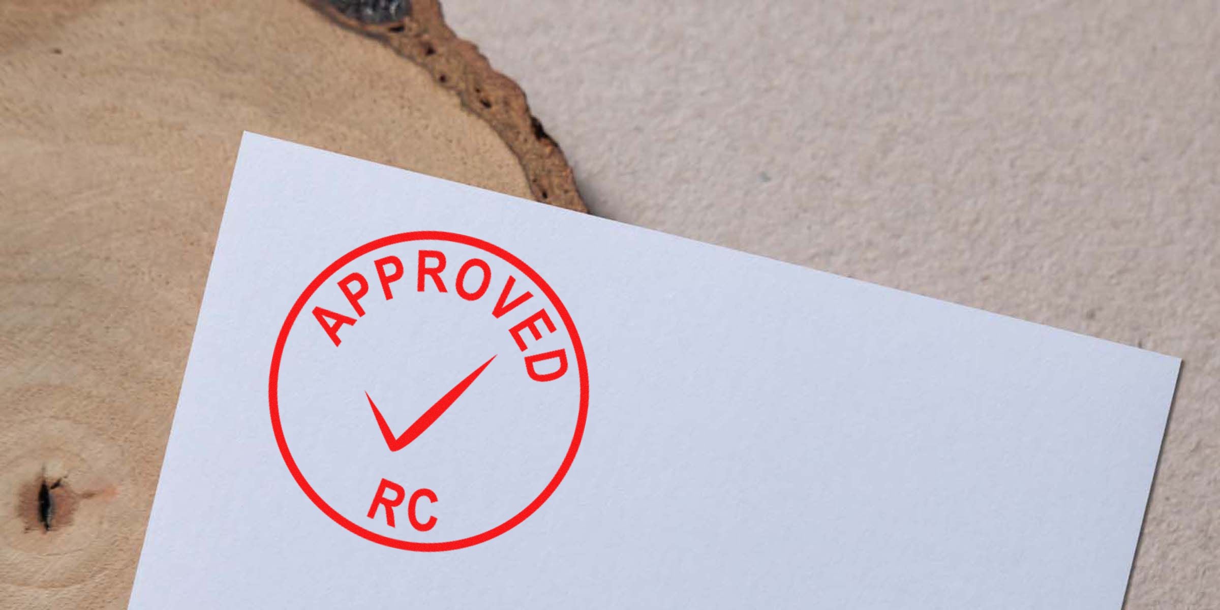 Red circular stamp with a check mark and the word "APPROVED RC" in red.