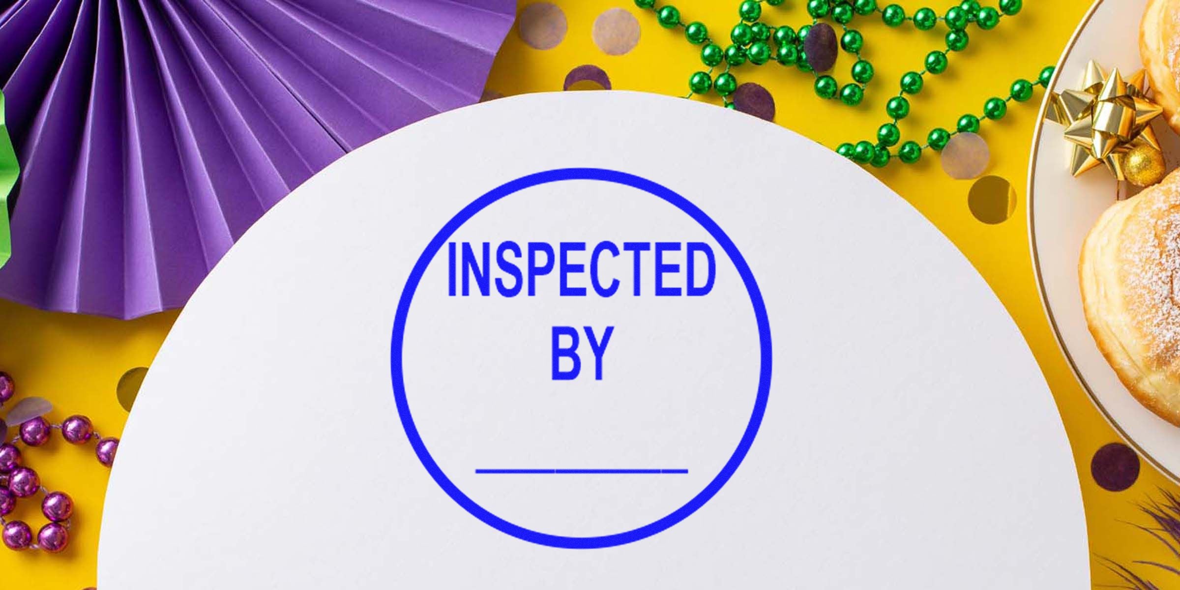 White circular badge with blue text reading "INSPECTED BY" on a colorful party table background.