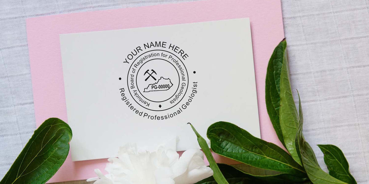 Kentucky Registered Professional Geologist stamp on white paper with green leaves and a pink background.