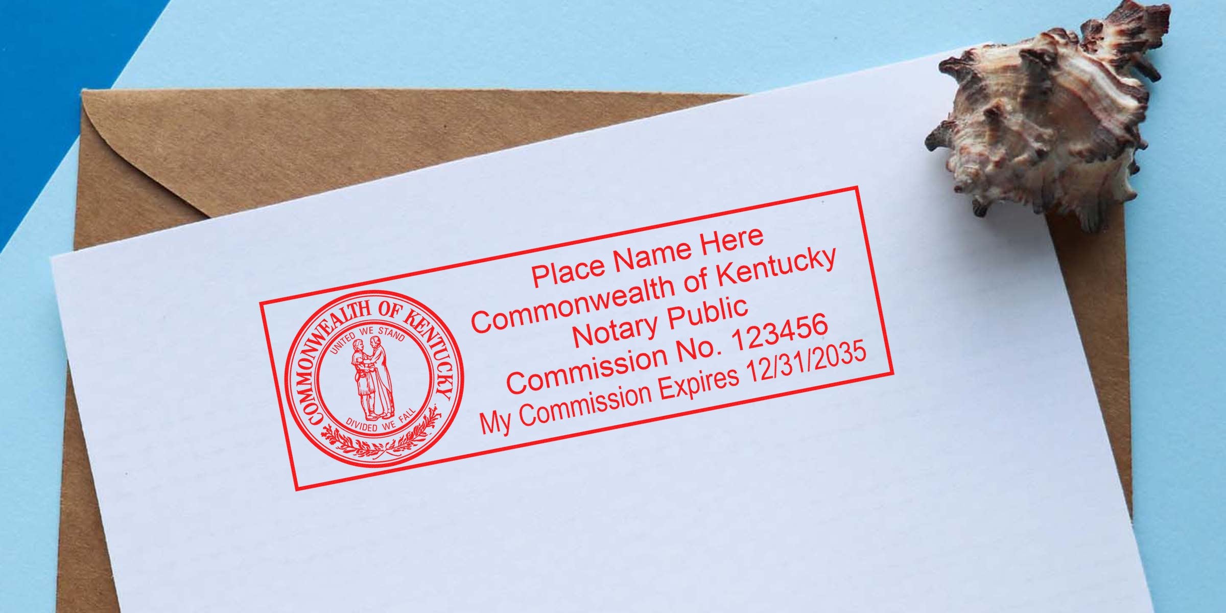 Red ink Commonwealth of Kentucky notary stamp on white letter paper over a brown envelope, rectangular notary seal with state emblem, sample commission number and expiration text, seashell accent on top right, close-up, high-resolution.
