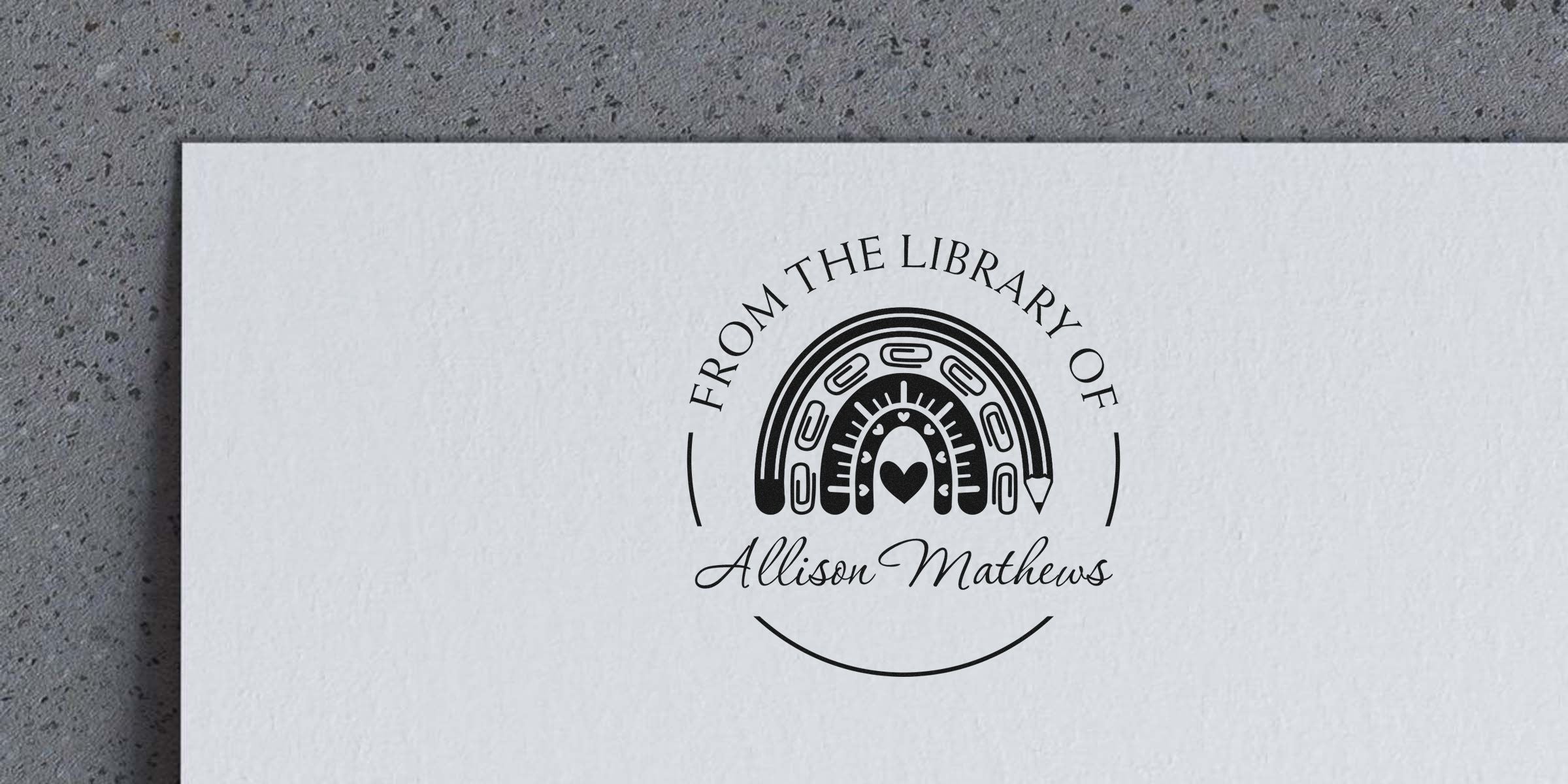 Logo reading “From the Library Of” surrounding a circular emblem with a heart at the center and the name “Allison Mathews.”