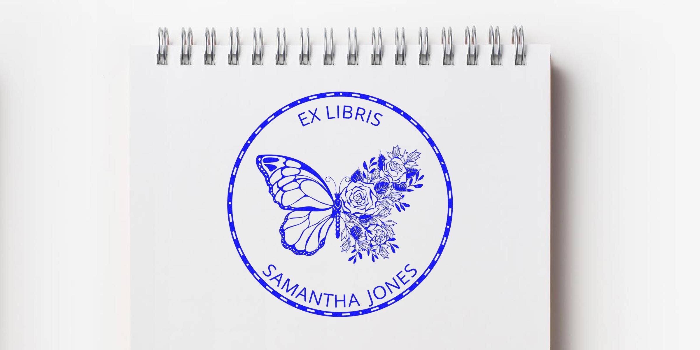 Ex Libris stamp featuring a blue butterfly and flowers, with the text “EX LIBRIS SAMANTHA JONES.”