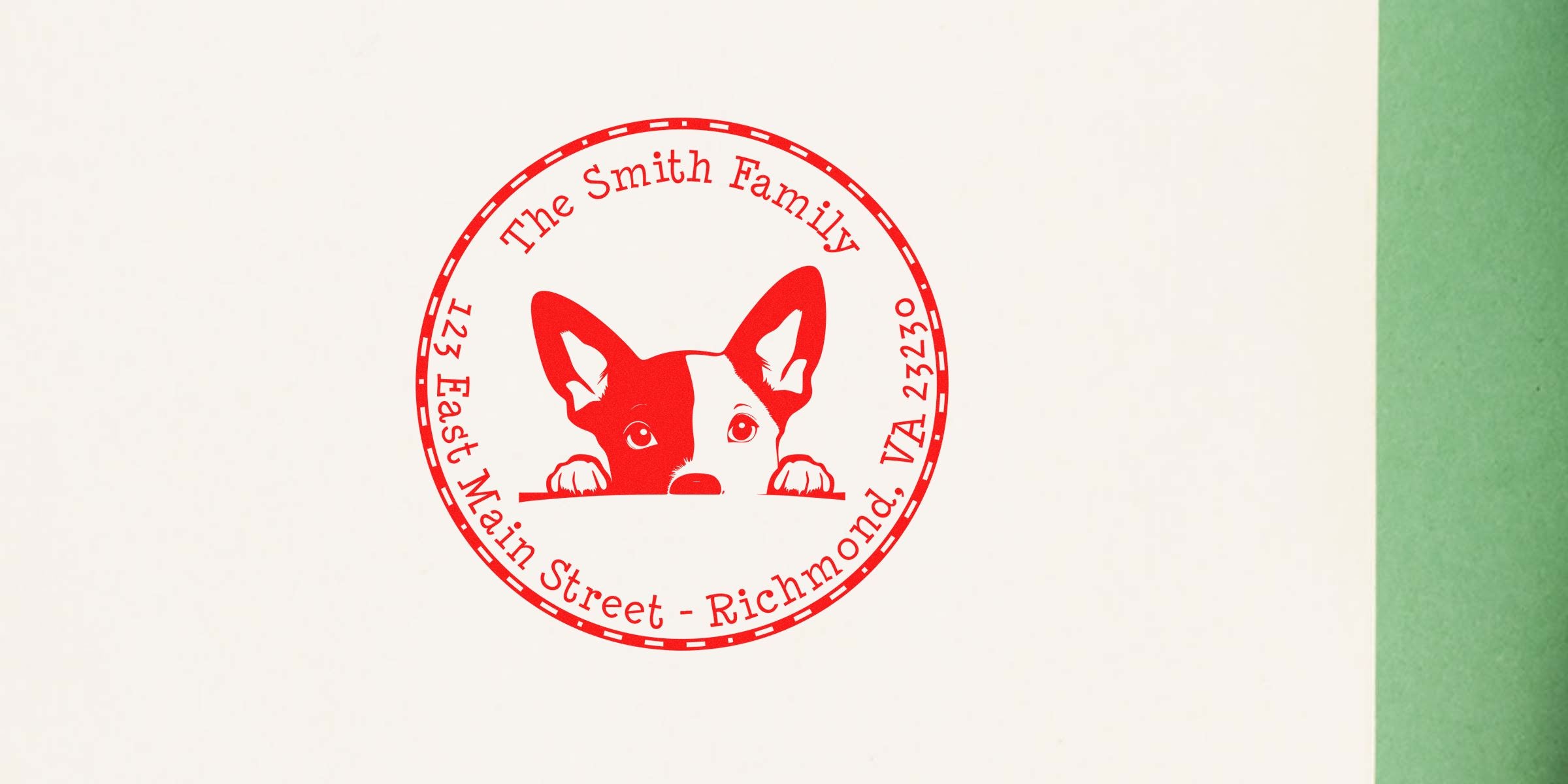 Red circular stamp with two puppies peeking over a wall and the text “The Smith Family” around the edge.