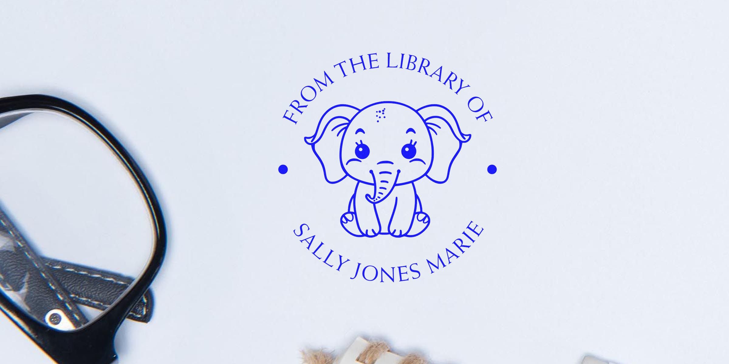 Logo reading “From the Library of Sally Jones Marie” with a cute blue elephant illustration.