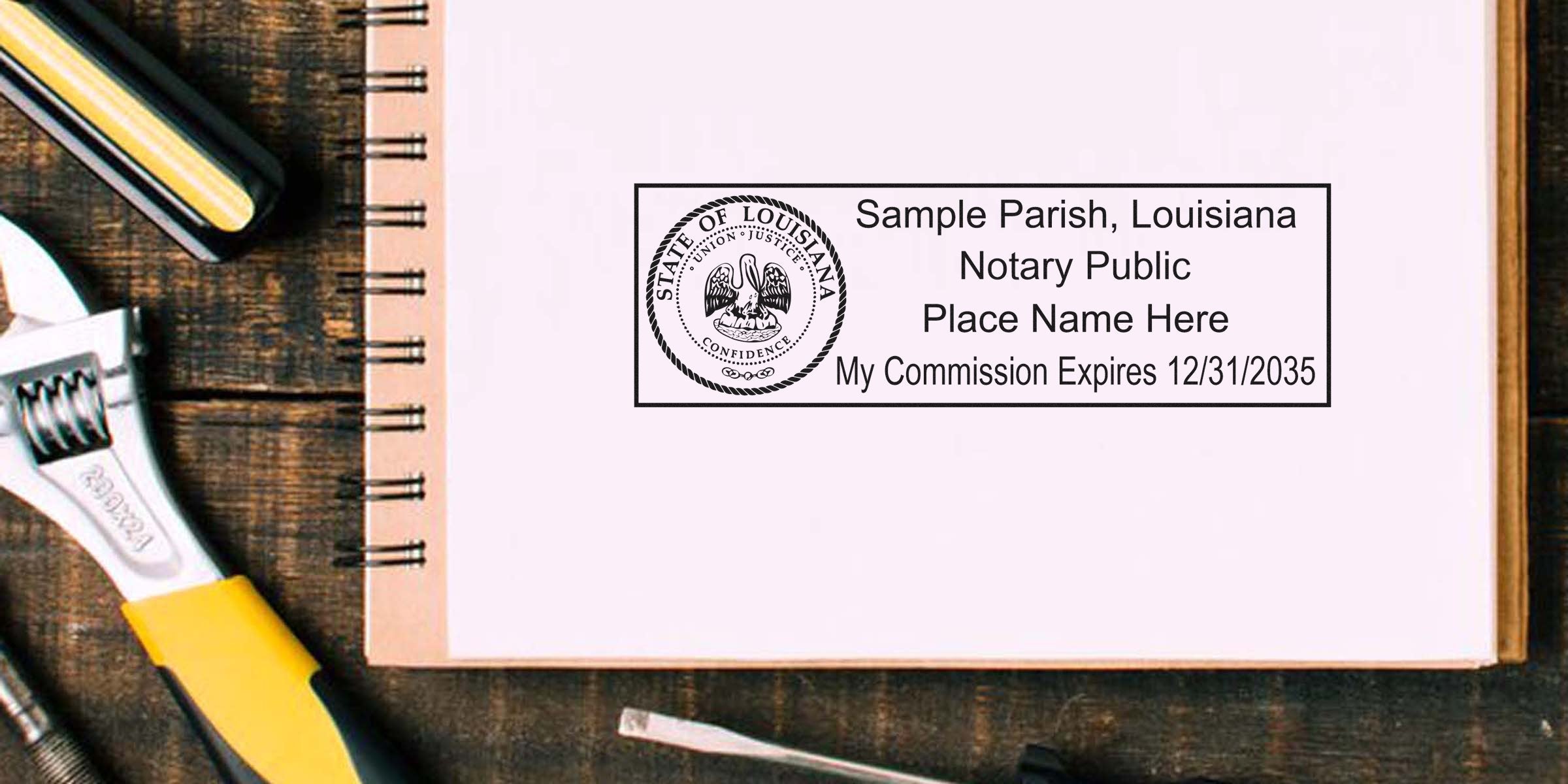 Notebook page with a Sample Parish, Louisiana notary public stamp imprint next to wrench and screwdriver on a wooden workbench workspace