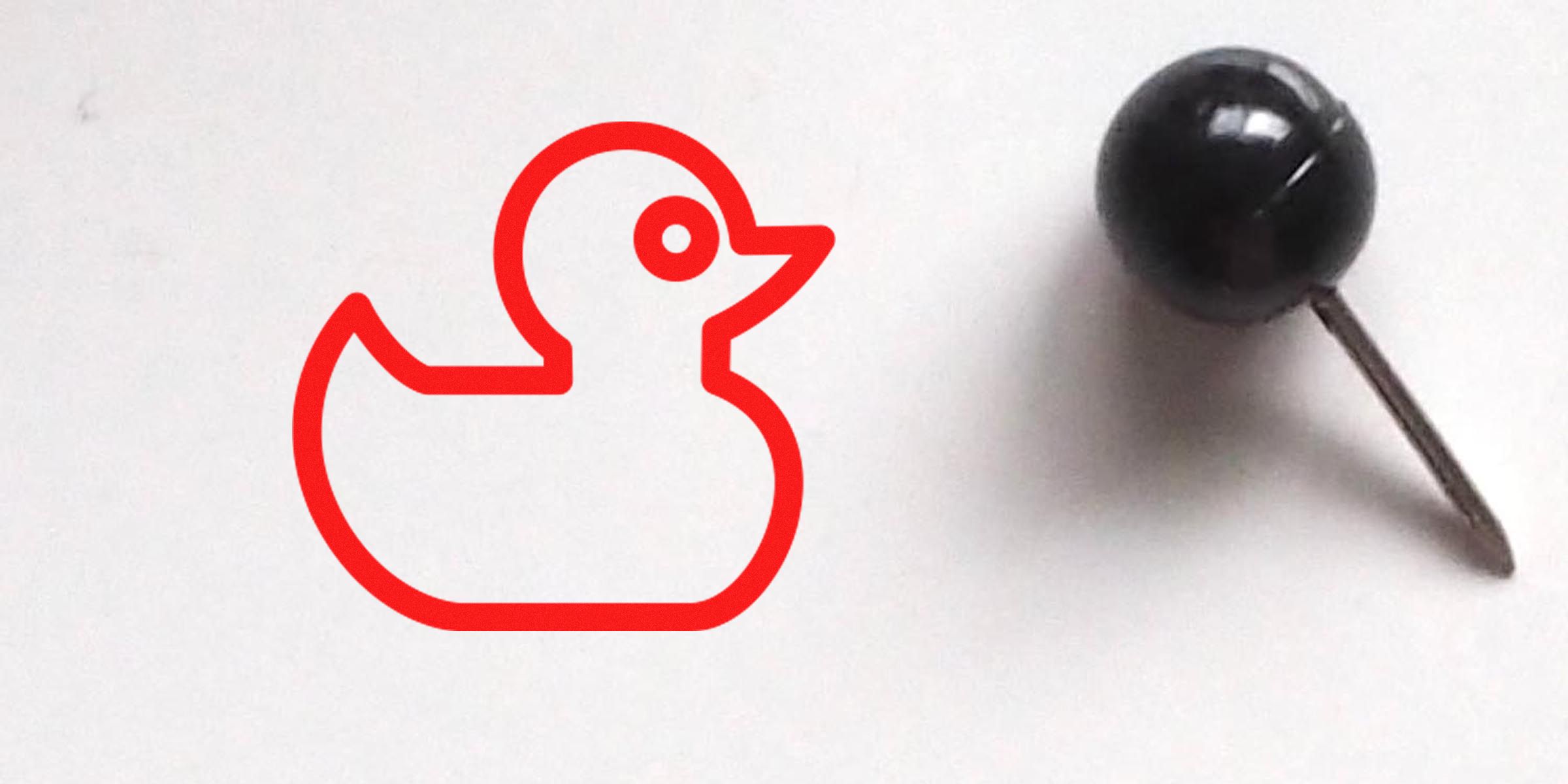 Red line drawing of a rubber duck on a white background.