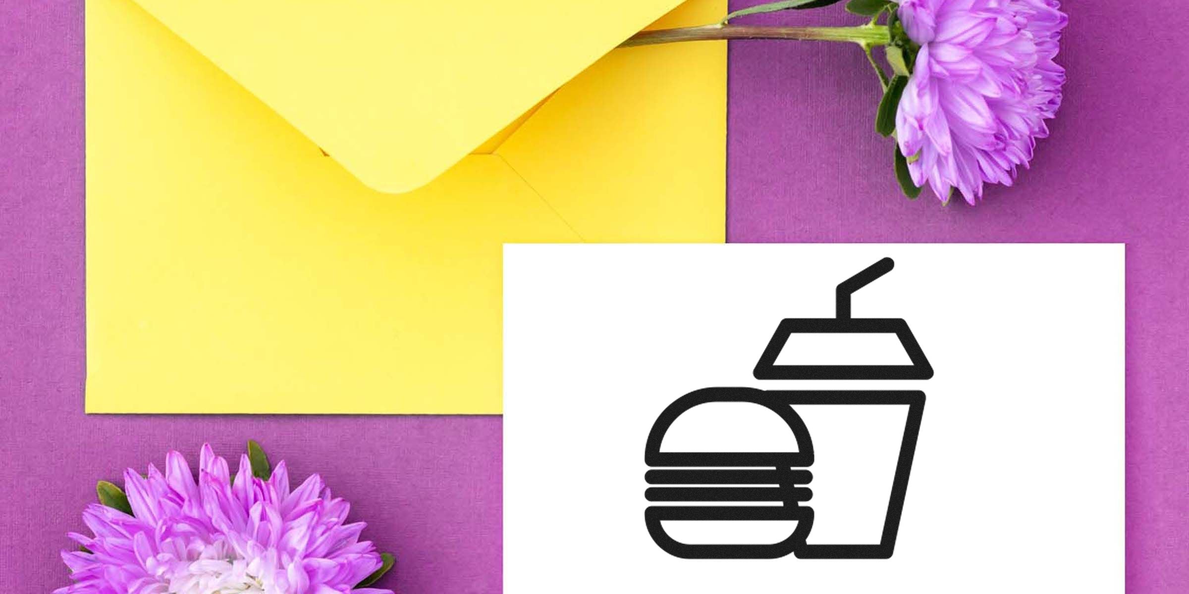 Black line drawing of a burger and a fast-food drink on a white card.