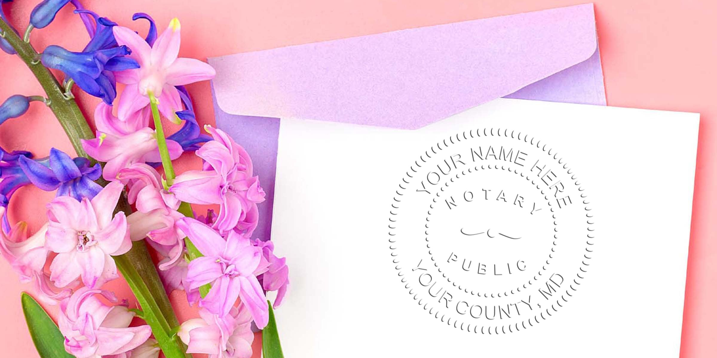 Pink and purple hyacinth flowers next to a lavender envelope and white card featuring a round notary public seal mockup on a pastel pink background