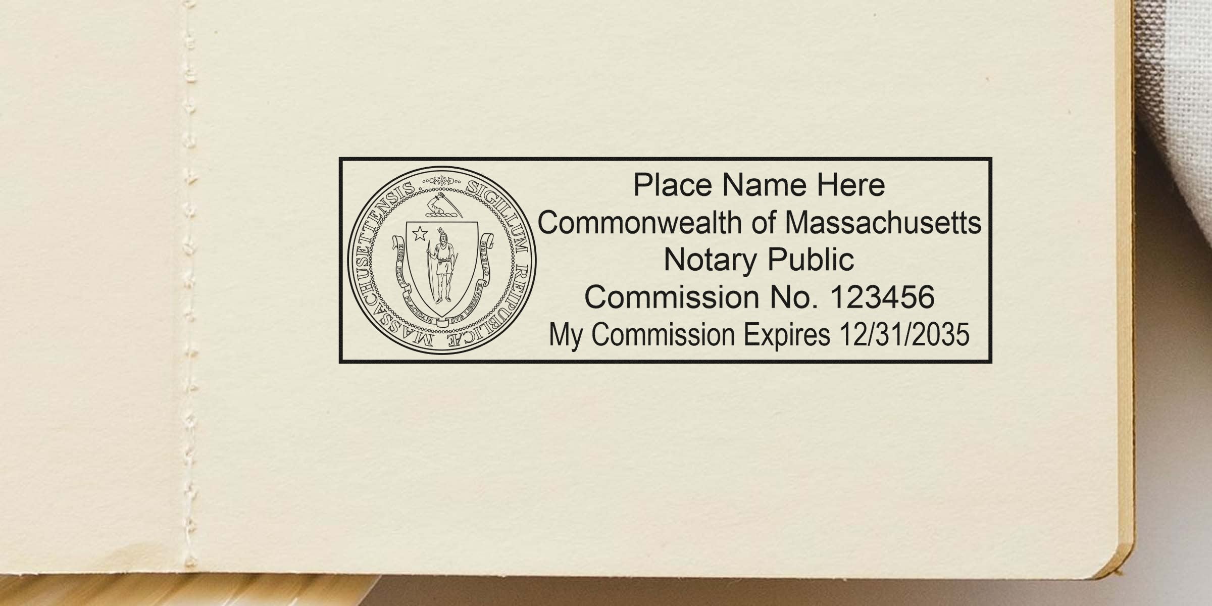 Massachusetts notary public stamp on cream paper showing state seal at left and text "Place Name Here, Commonwealth of Massachusetts, Notary Public, Commission No. 123456, My Commission Expires 12/31/2035" inside a rectangular border.
