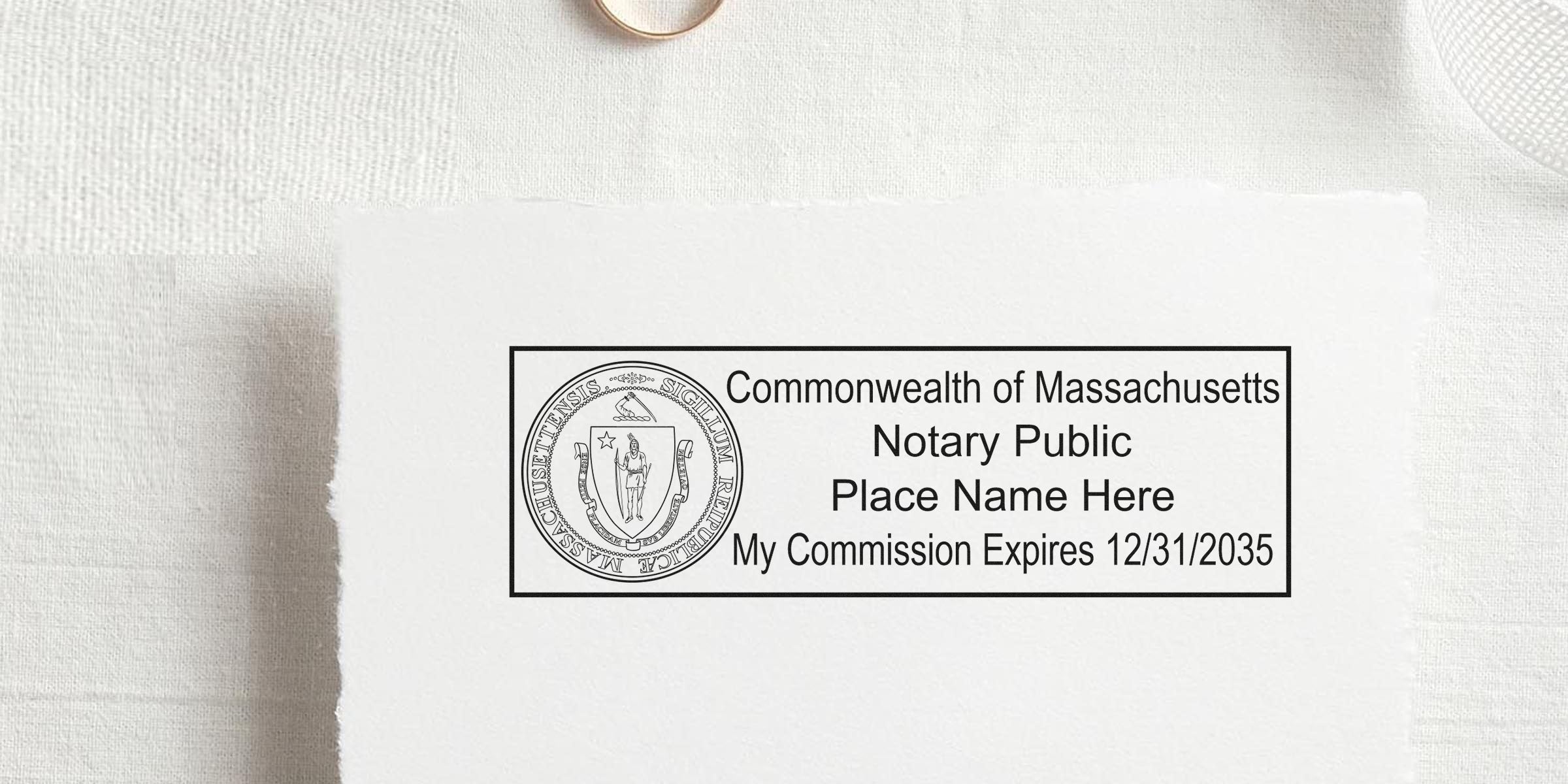 Massachusetts notary public stamp template with state seal, placeholder "Place Name Here" and commission expiration date 12/31/2035 on white textured paper