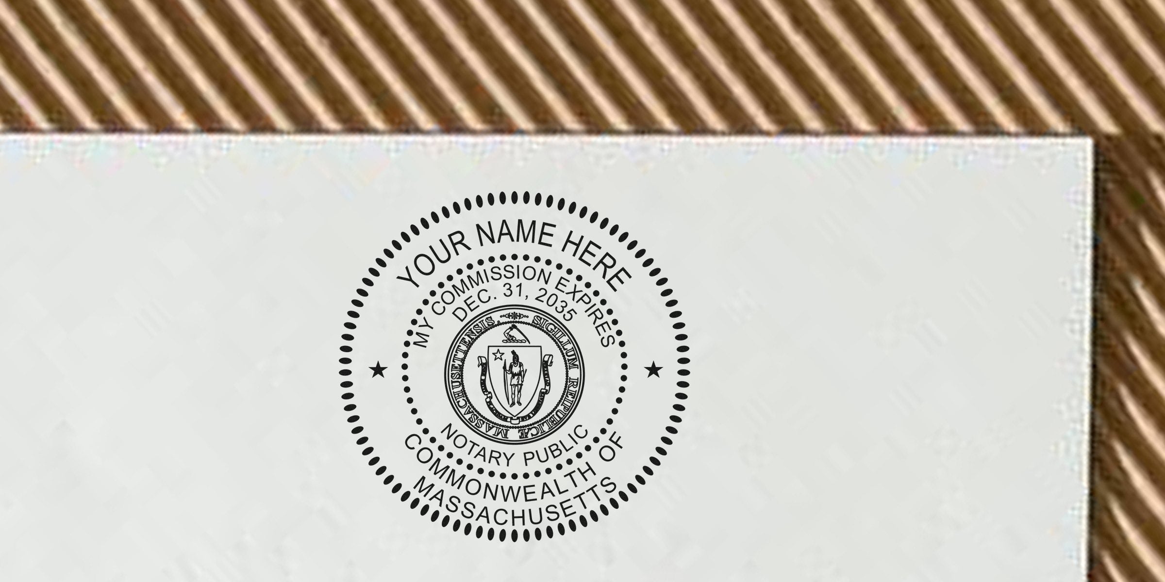 Close-up of circular notary public seal stamped on document reading "Your Name Here," Commonwealth of Massachusetts emblem and expiration date Dec. 31, 2035, black ink on white paper with decorative border