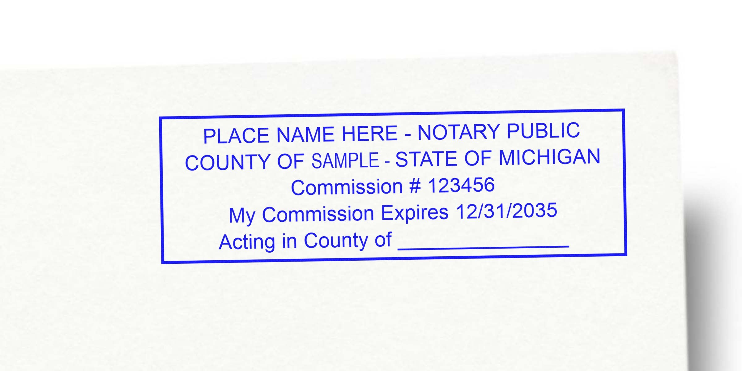 Blue rectangular notary stamp on white paper reading "PLACE NAME HERE - NOTARY PUBLIC, COUNTY OF SAMPLE - STATE OF MICHIGAN, Commission #123456, My Commission Expires 12/31/2035"