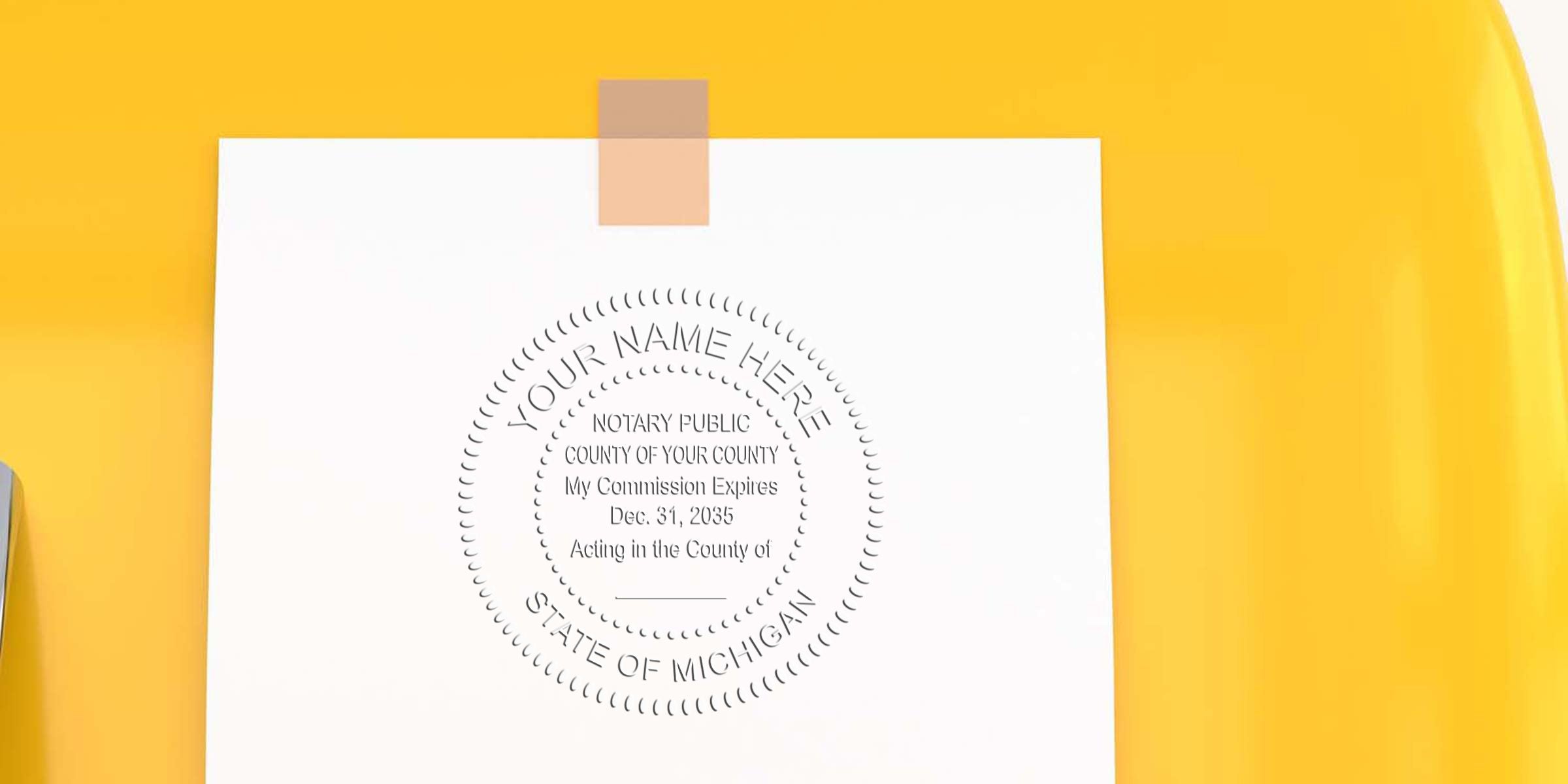 Mockup of white paper taped to a yellow background showing a circular notary seal design reading "Your Name Here" and "State of Michigan"