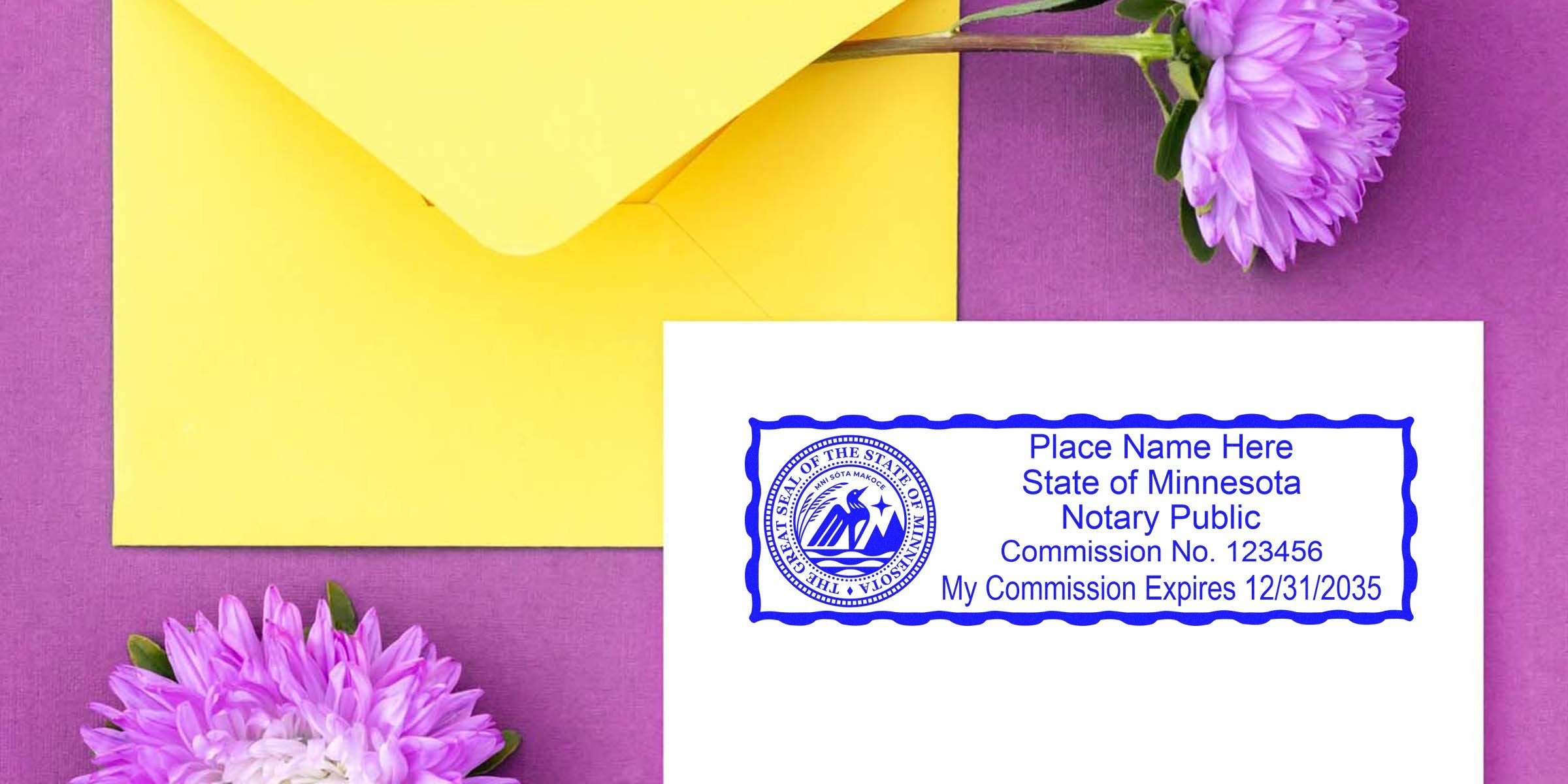 Flat lay of a Minnesota notary commission card stamped in blue on white paper beside a yellow envelope and purple chrysanthemums on a purple background