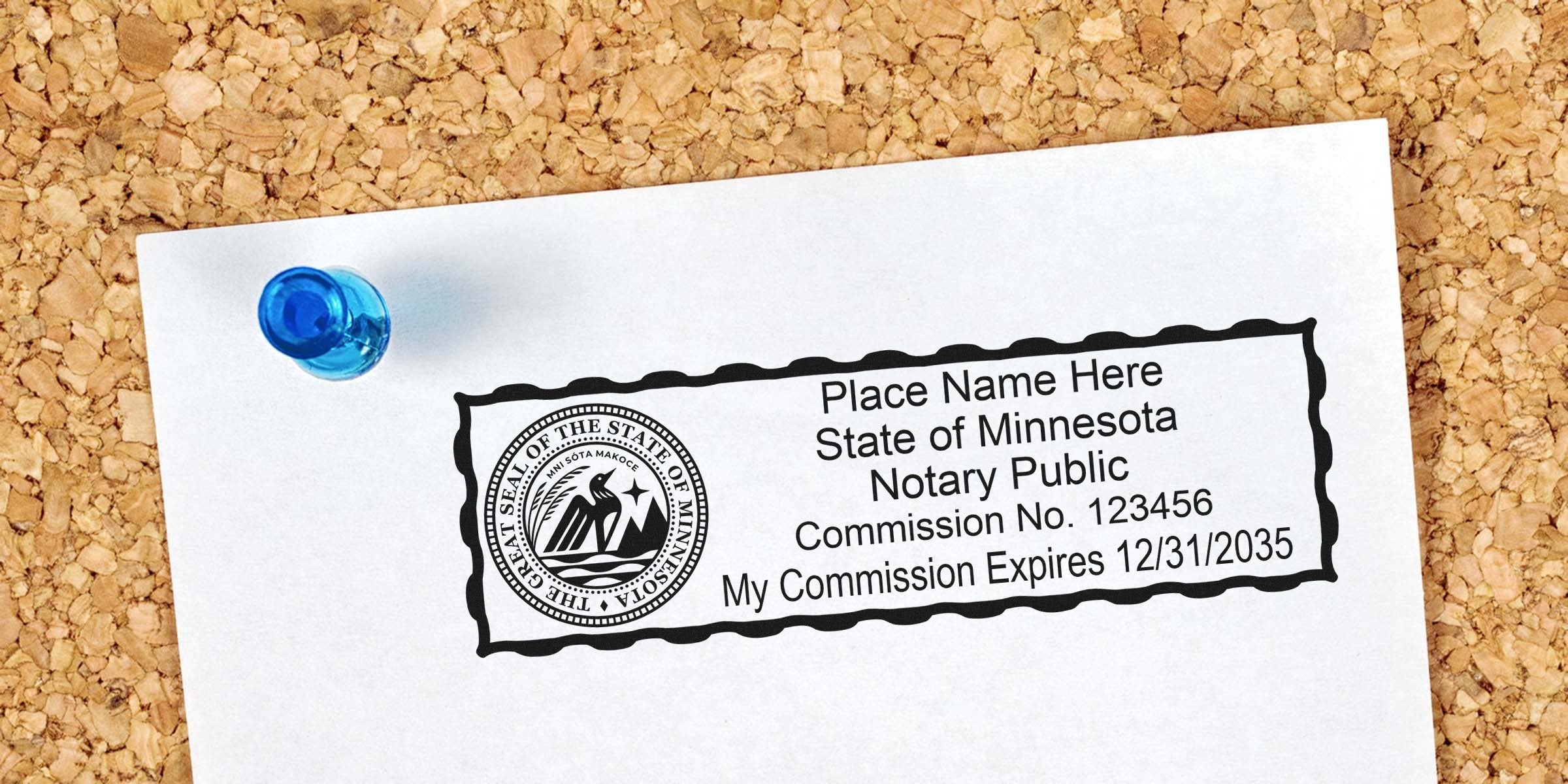 Minnesota notary stamp impression with state seal, sample name, commission number and expiry date pinned by a blue pushpin on a corkboard