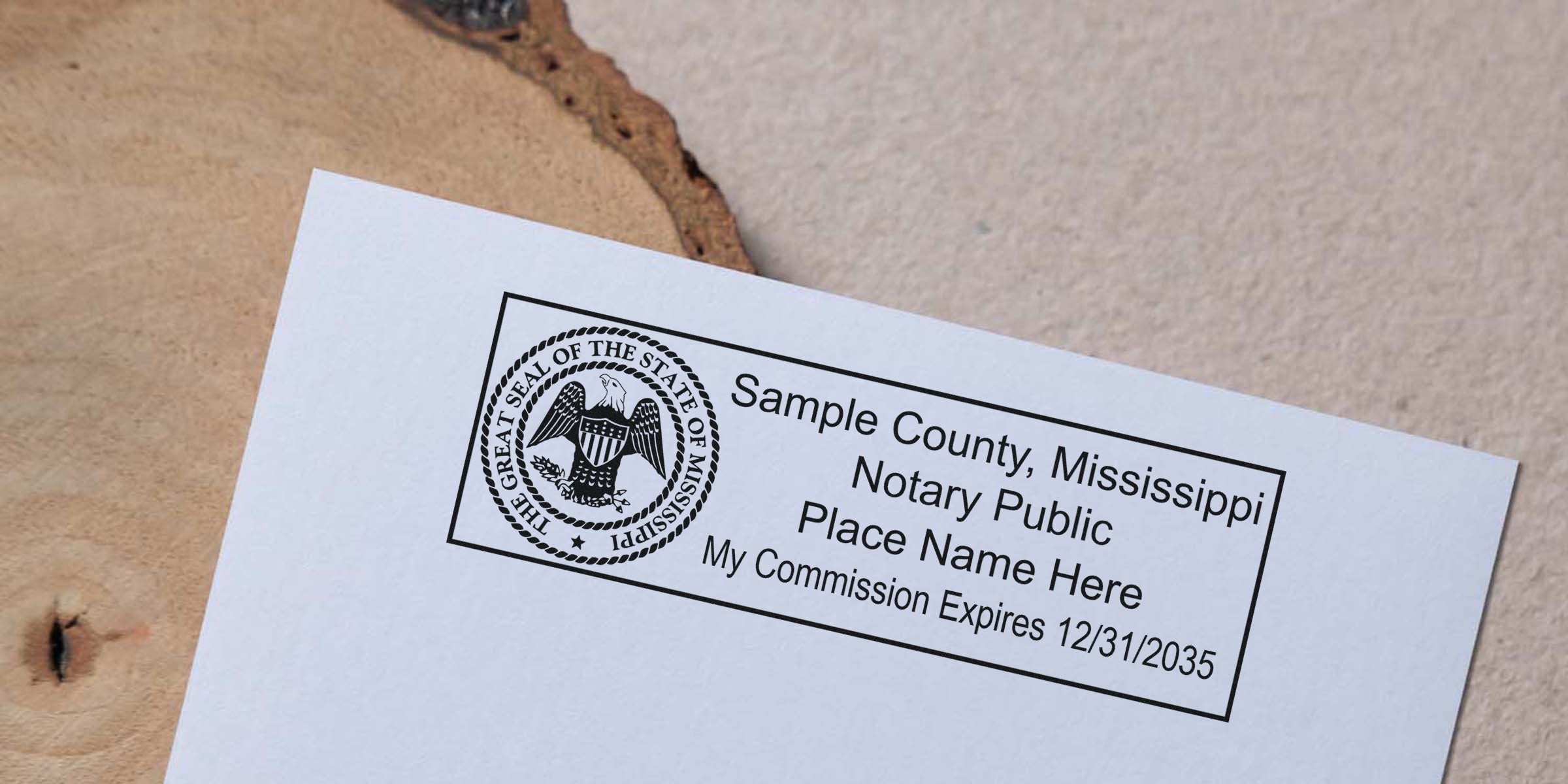 Close-up of a Sample County, Mississippi notary public stamp on paper featuring the state seal, placeholder name text and commission expiration date 12/31/2035.
