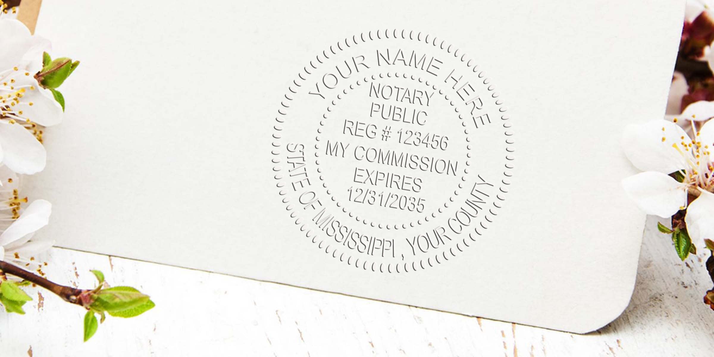 Embossed notary public seal mockup on white cardstock with delicate white blossom flowers and rustic wooden background — customizable name, registration and commission expiry text.