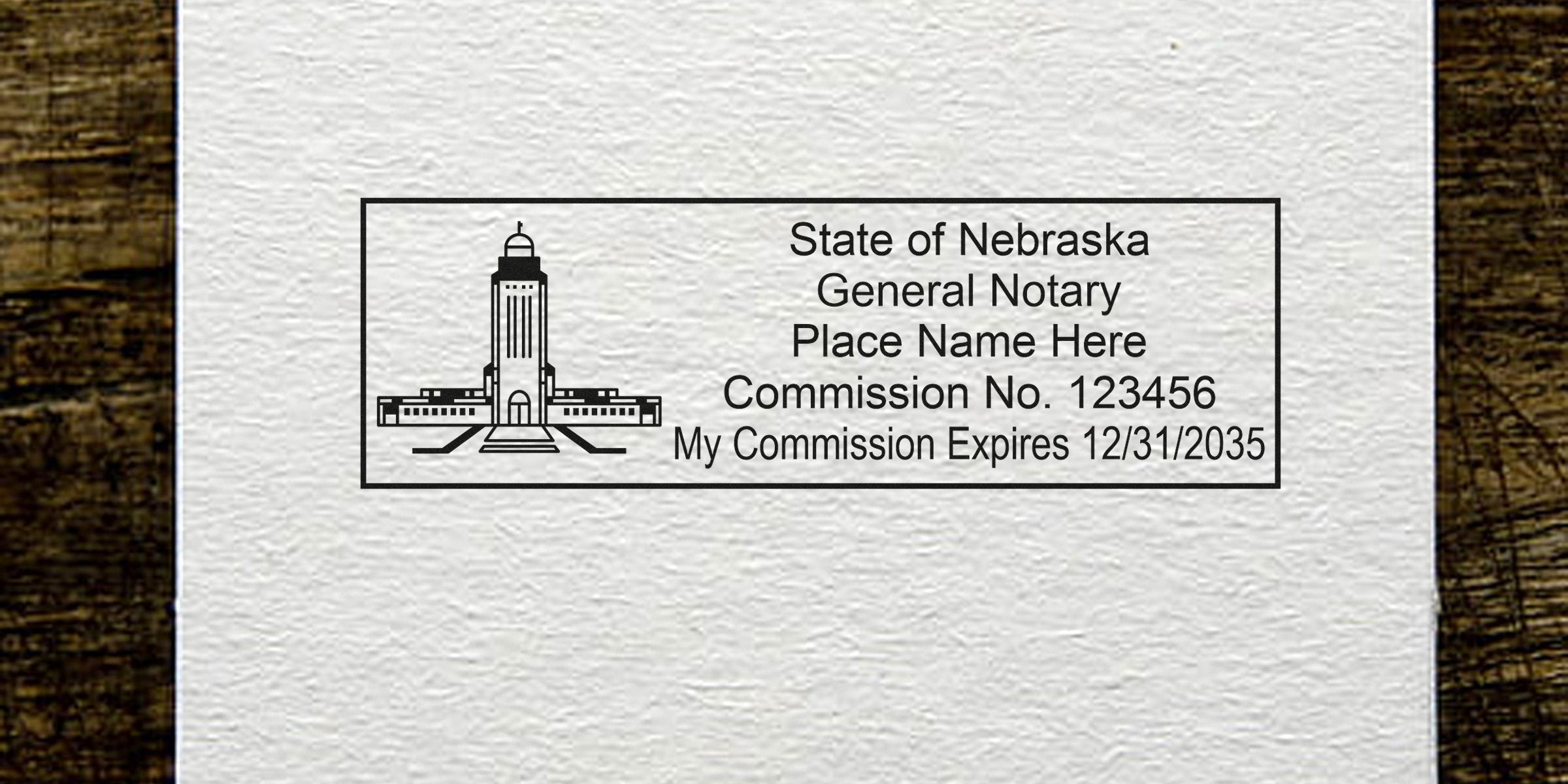 Nebraska notary stamp on textured paper showing capitol building icon, placeholder name, Commission No. 123456 and commission expiration 12/31/2035 inside a rectangular border