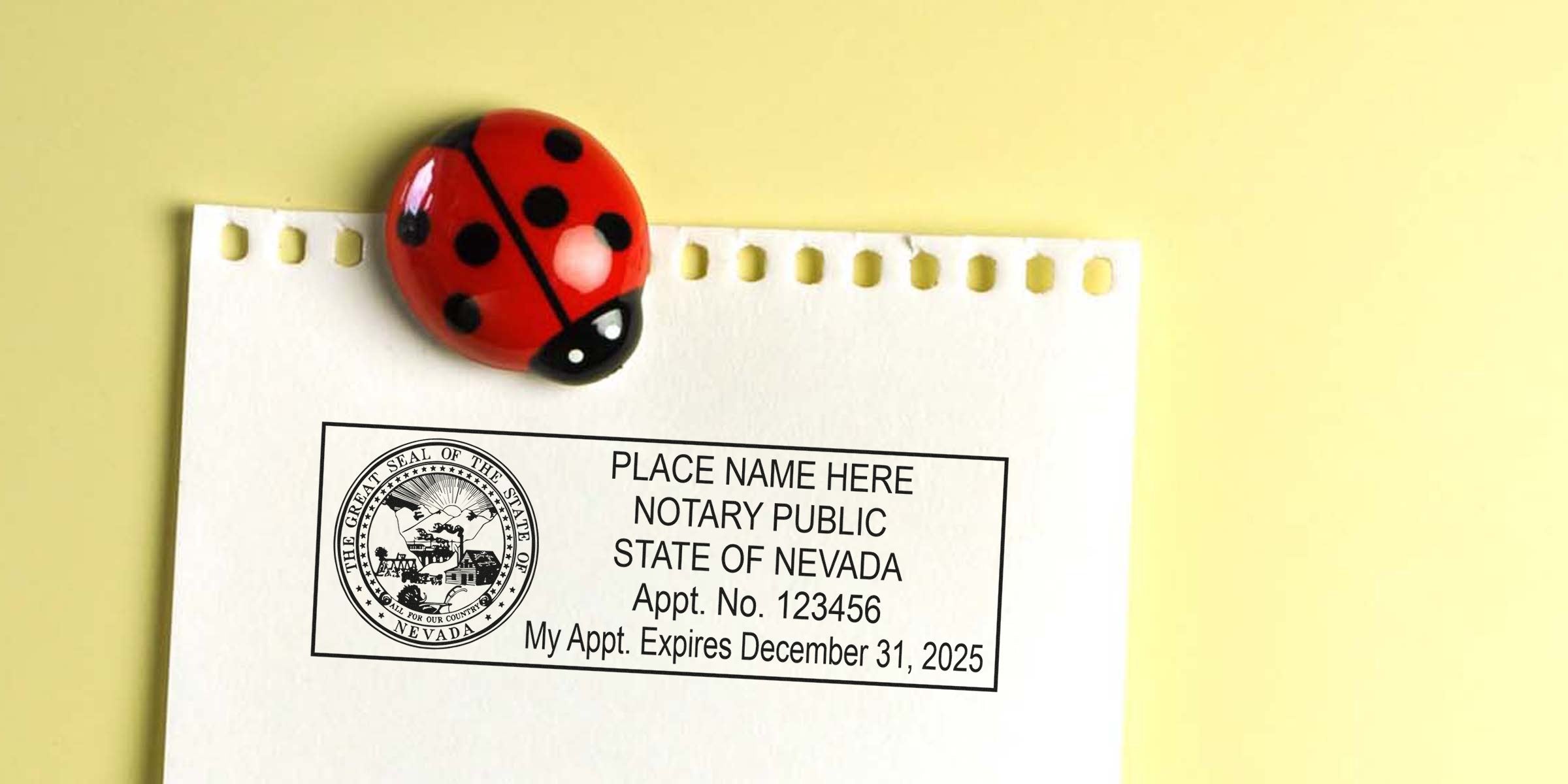 Nevada notary public stamp on torn notebook paper showing appointment number and expiration date, secured by a red ladybug magnet on a pale yellow background